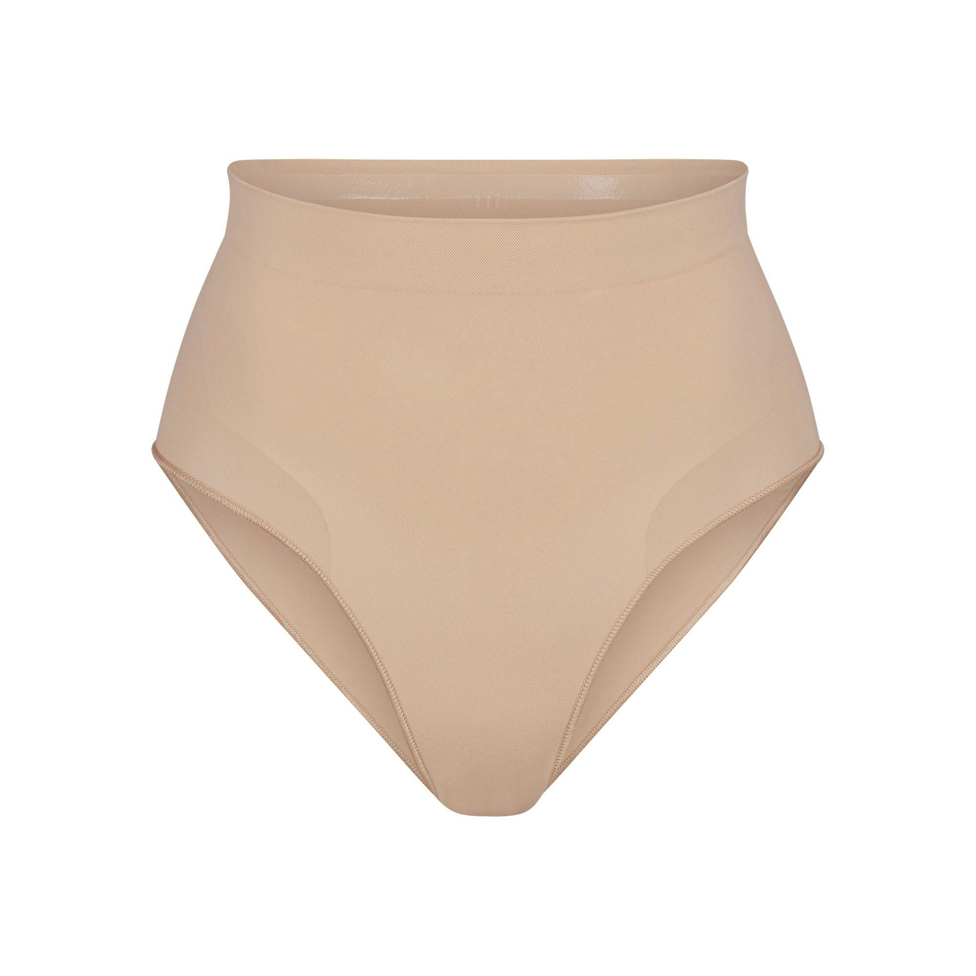 SEAMLESS SCULPT MID WAIST BRIEF | MICA (SHAPEWEAR BRIEFS, PANTIES) LAYS FLAT ON A WHITE BACKGROUND | FLT
