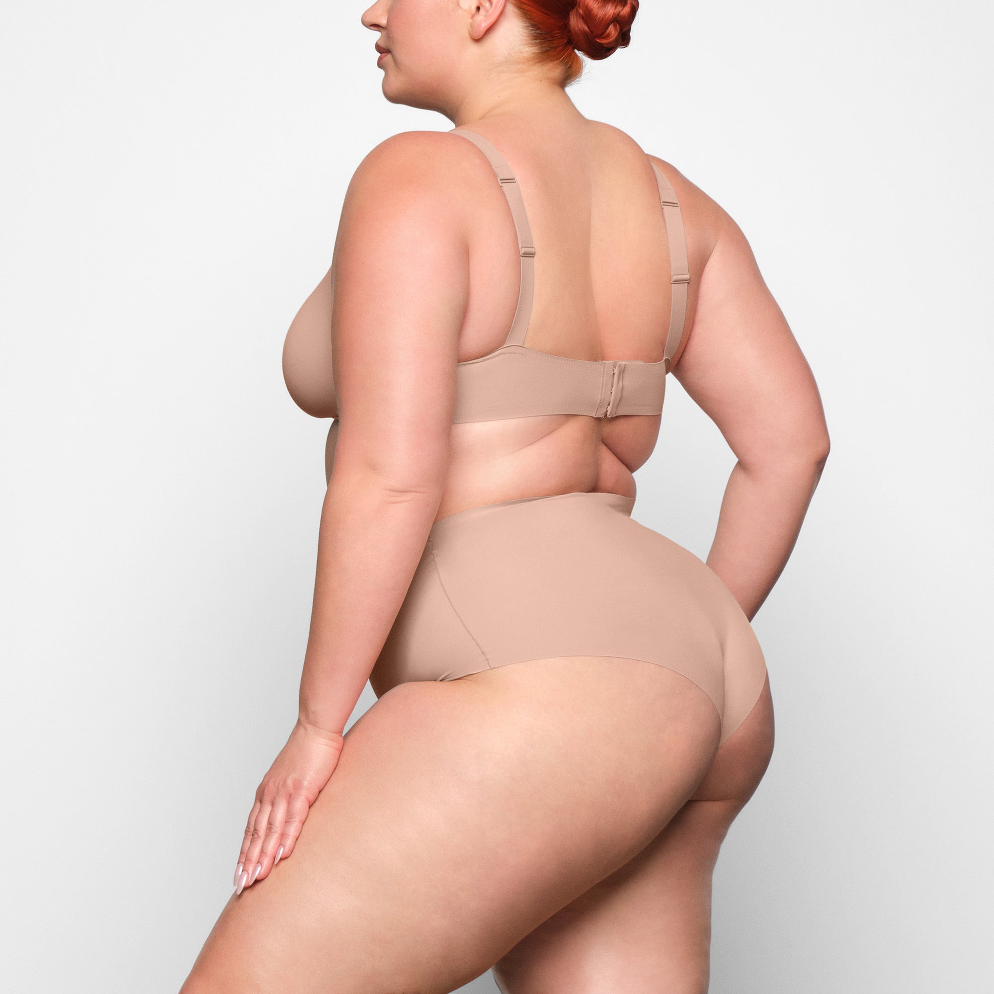NAKED BOY SHORT WORN ON A MODEL IN SIDE VIEW