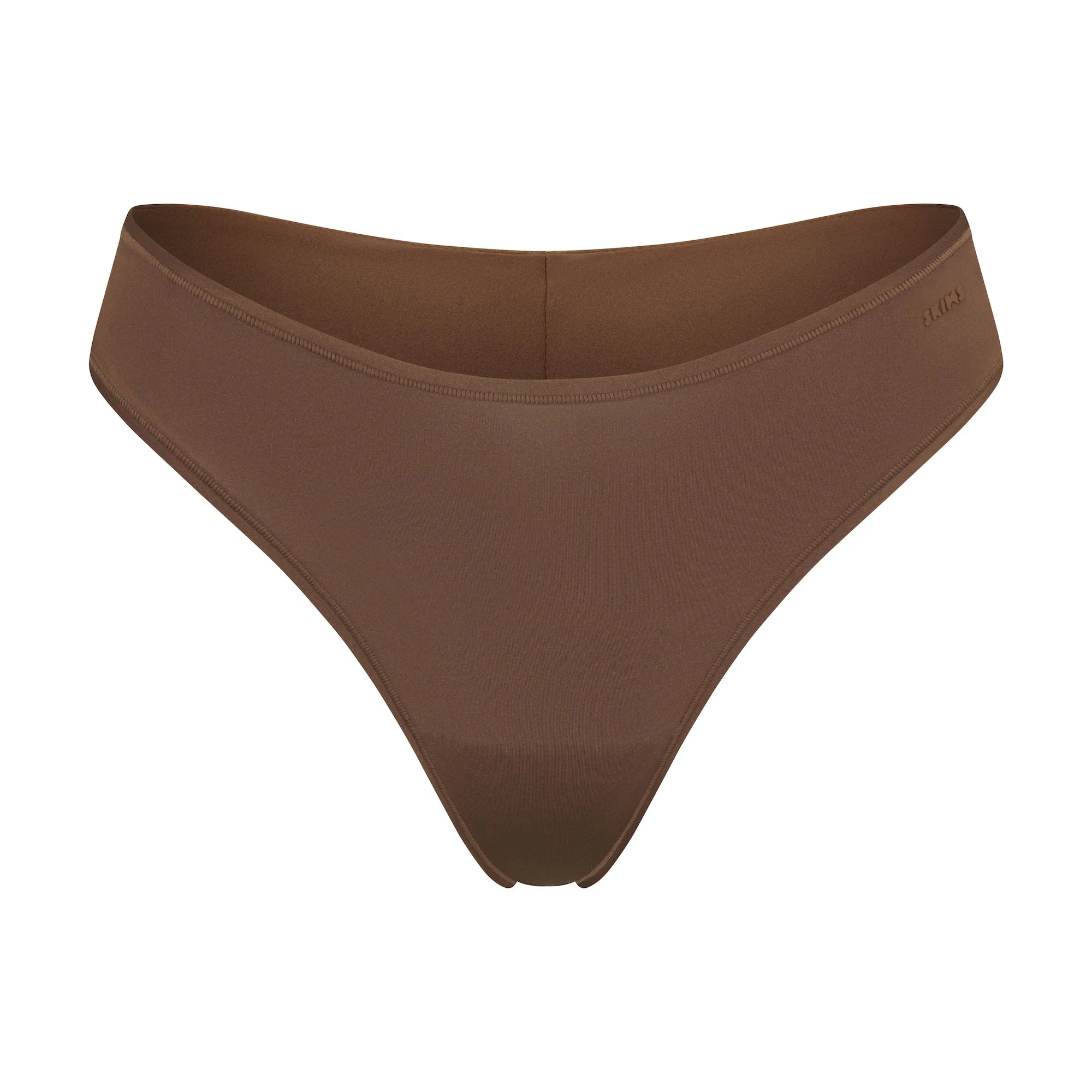 SHINE FOUNDATIONS THONG LAYS FLAT ON A WHITE BACKGROUND | FLT
