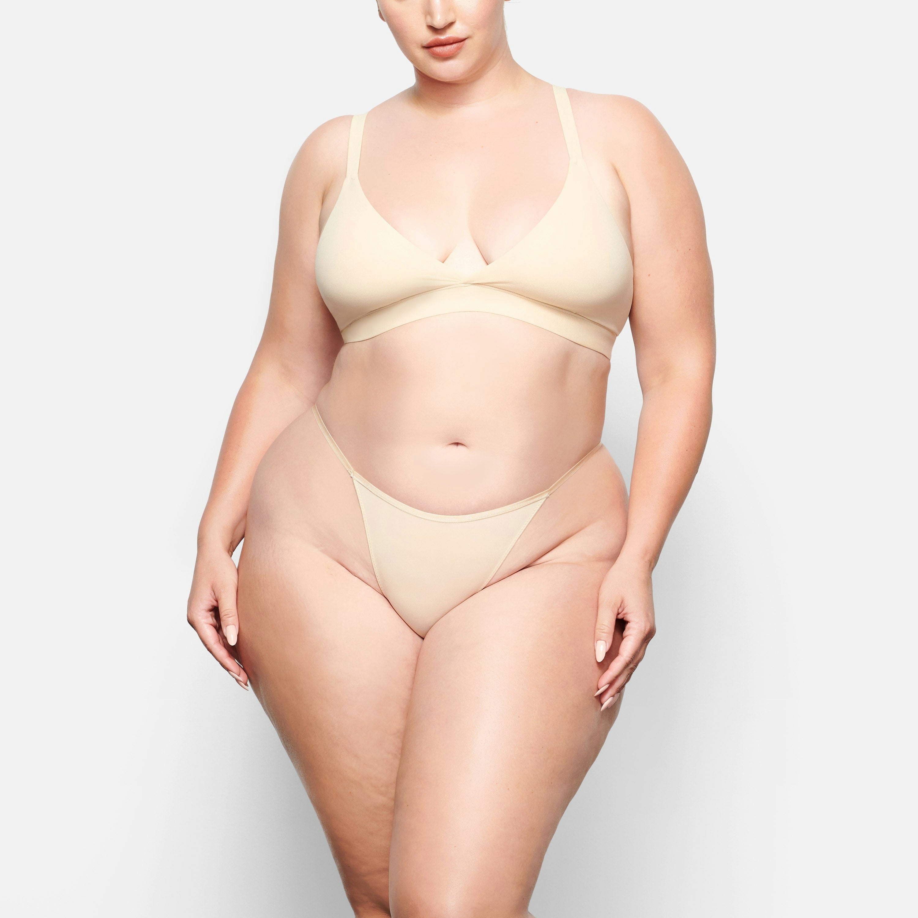 FRONT VIEW OF THE FITS EVERYBODY CHEEKY STRING BIKINI ON A MODEL