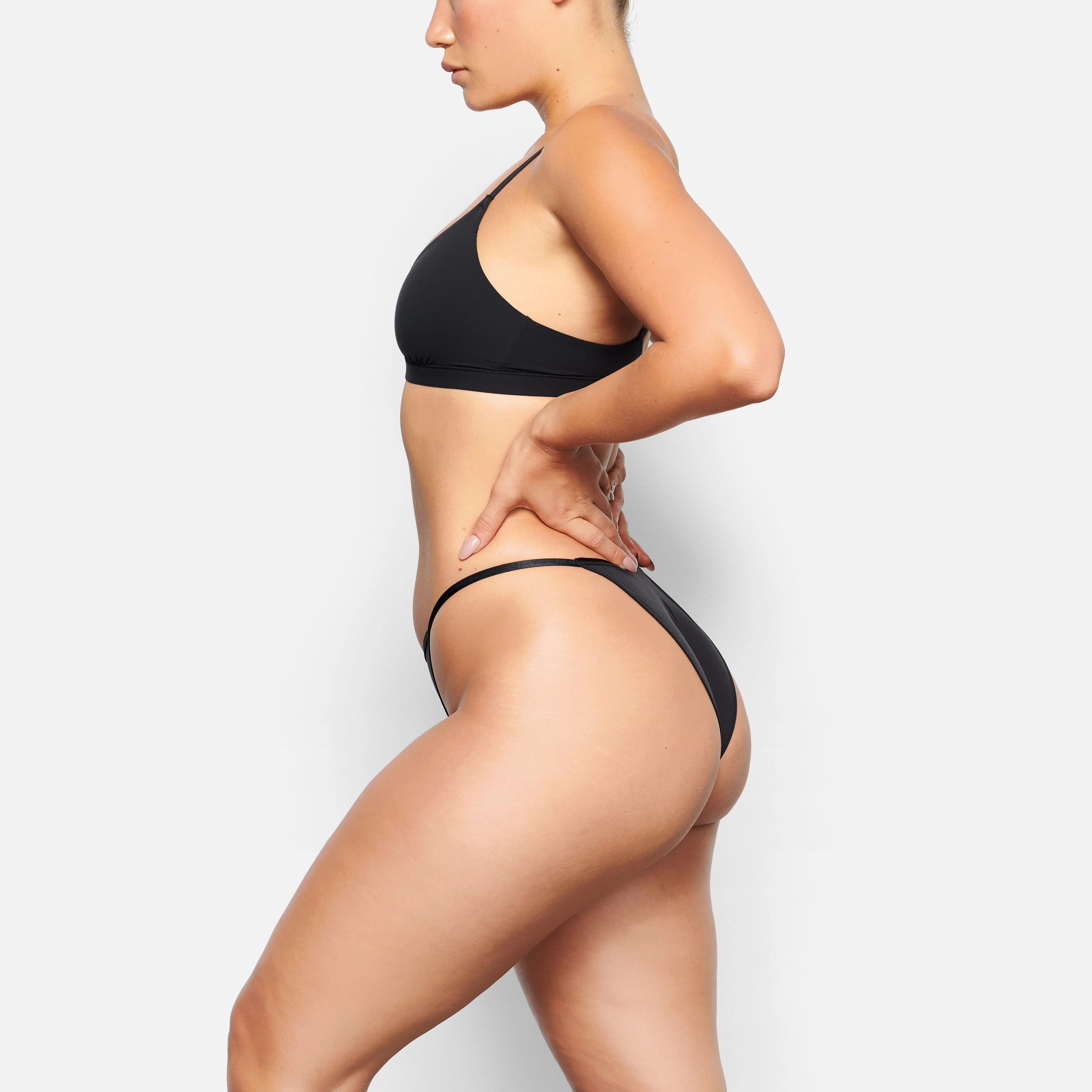 side VIEW OF THE FITS EVERYBODY CHEEKY STRING BIKINI ON A MODEL