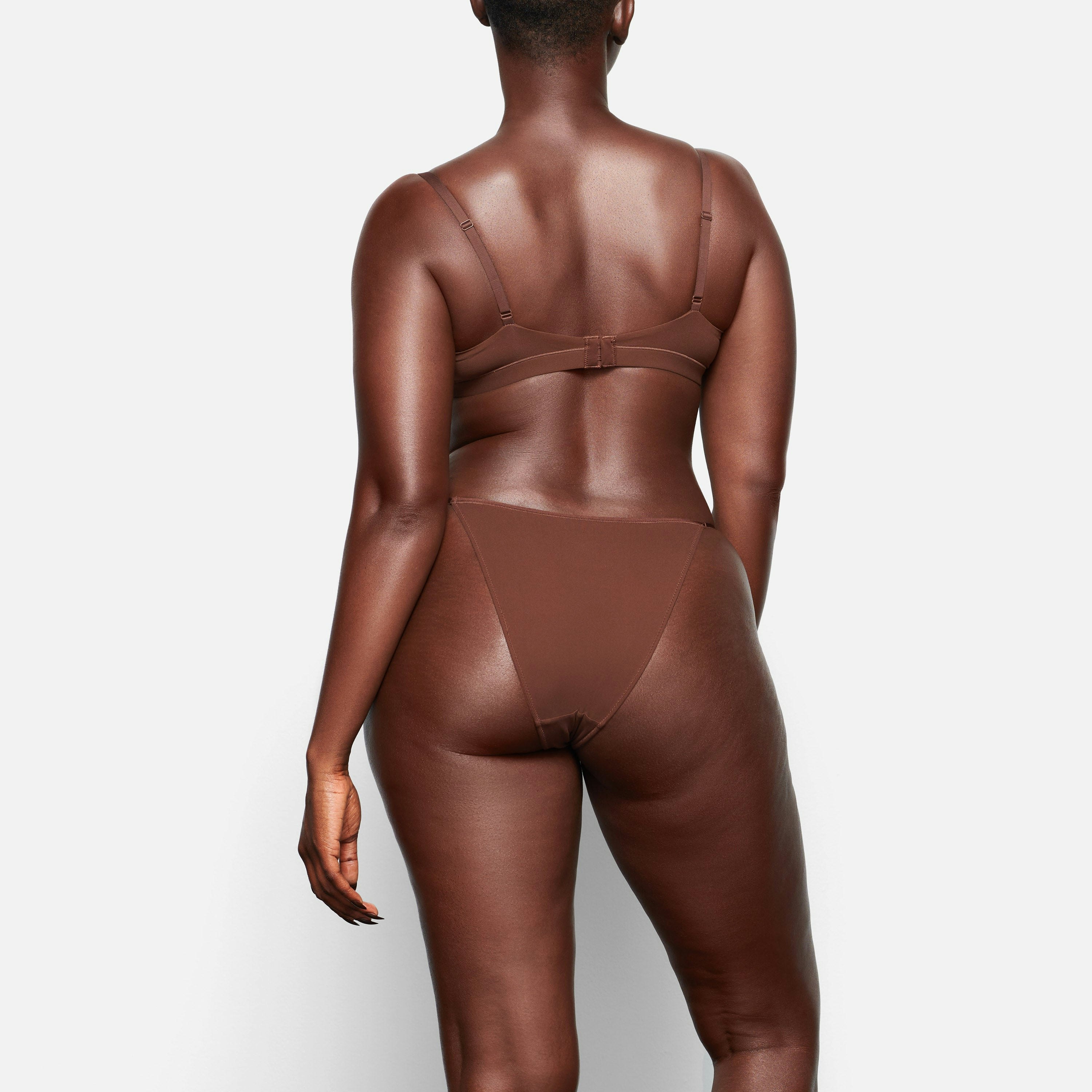 BACK VIEW OF THE FITS EVERYBODY CHEEKY STRING BIKINI ON A MODEL