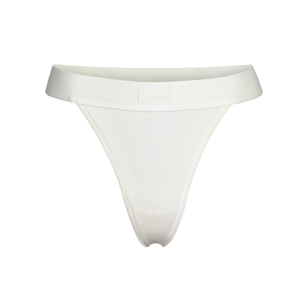 COTTON RIB THONG | BONE (THONGS, PANTIES) LAYS FLAT ON A WHITE BACKGROUND | FLT