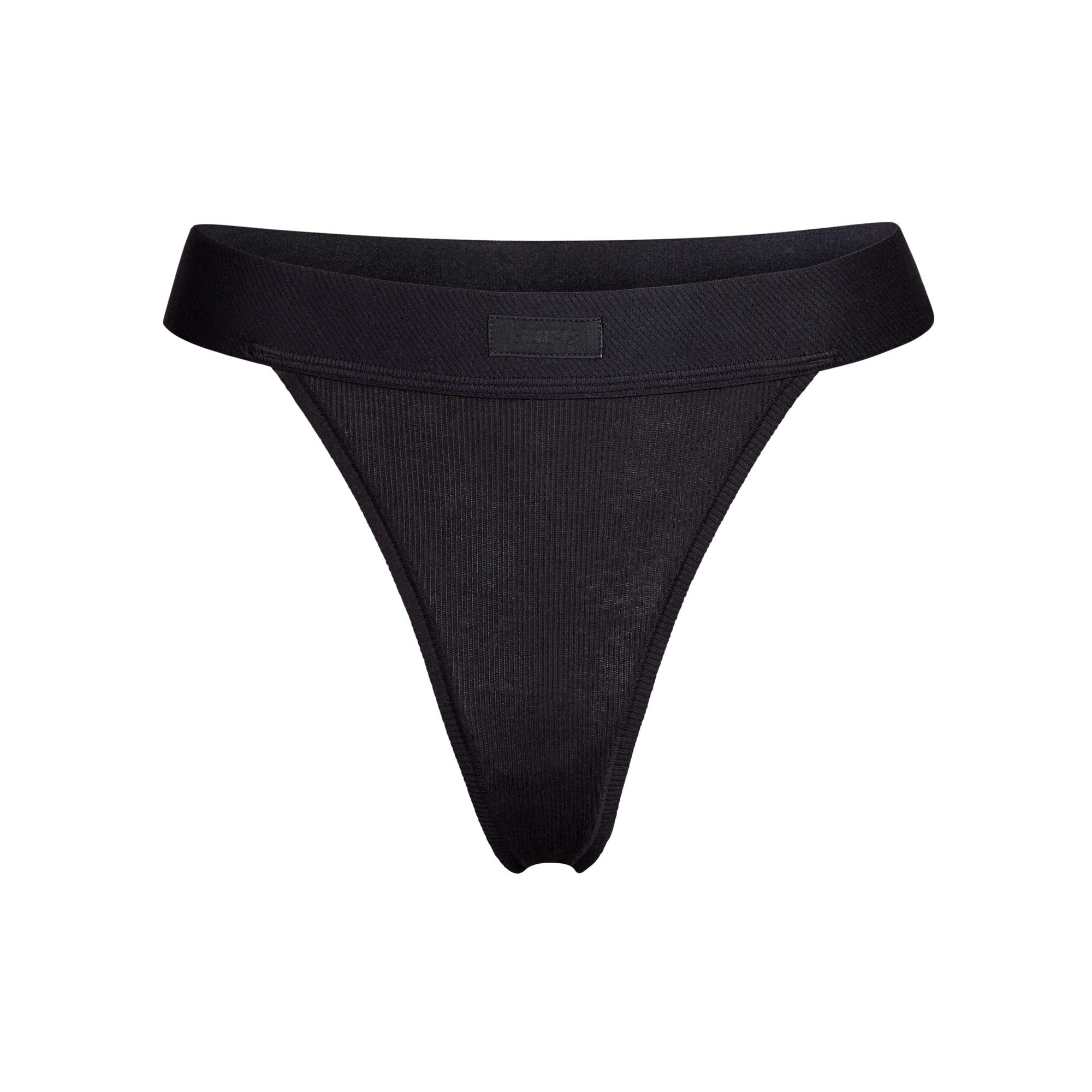 COTTON RIB THONG | SOOT (THONGS, PANTIES) LAYS FLAT ON A WHITE BACKGROUND | FLT