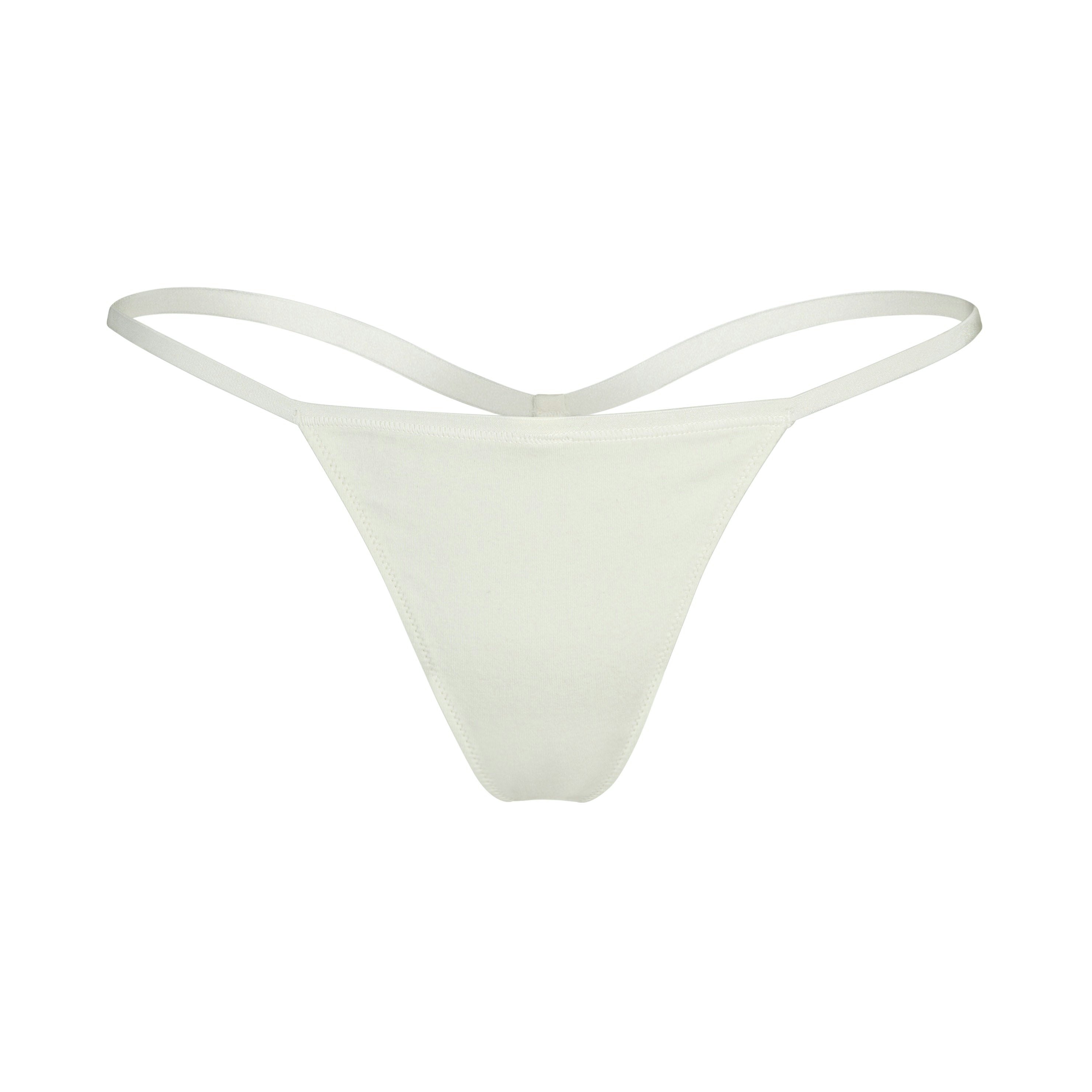 COTTON JERSEY T-STRING THONG LAYS FLAT ON A WHITE BACKGROUND | FLT