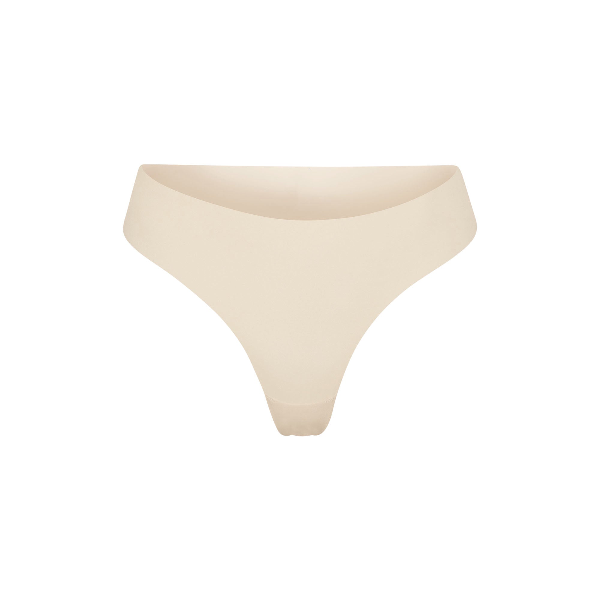 NAKED DIPPED THONG | SAND (THONGS, PANTIES) LAYS FLAT ON A WHITE BACKGROUND | FLT