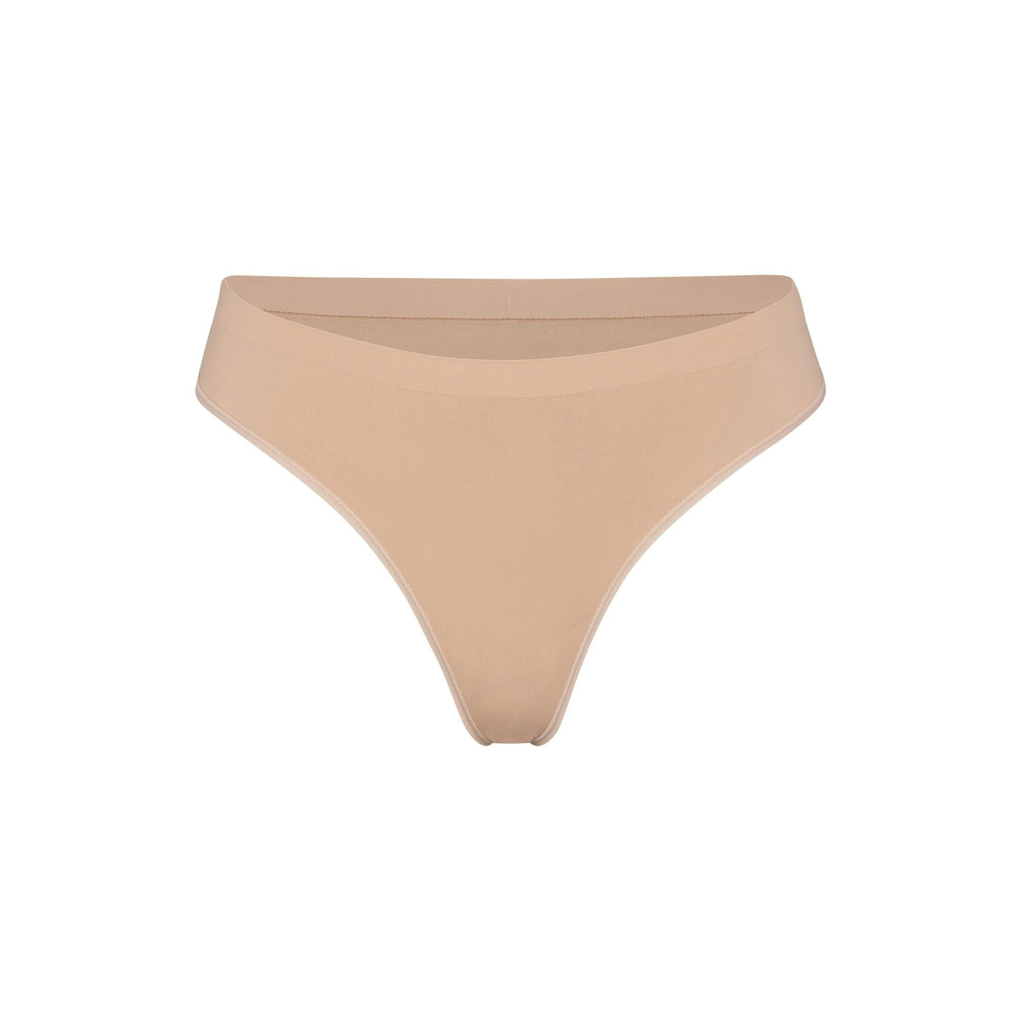 SOFT SMOOTHING SEAMLESS THONG | CLAY (THONGS, PANTIES) LAYS FLAT ON A WHITE BACKGROUND | FLT