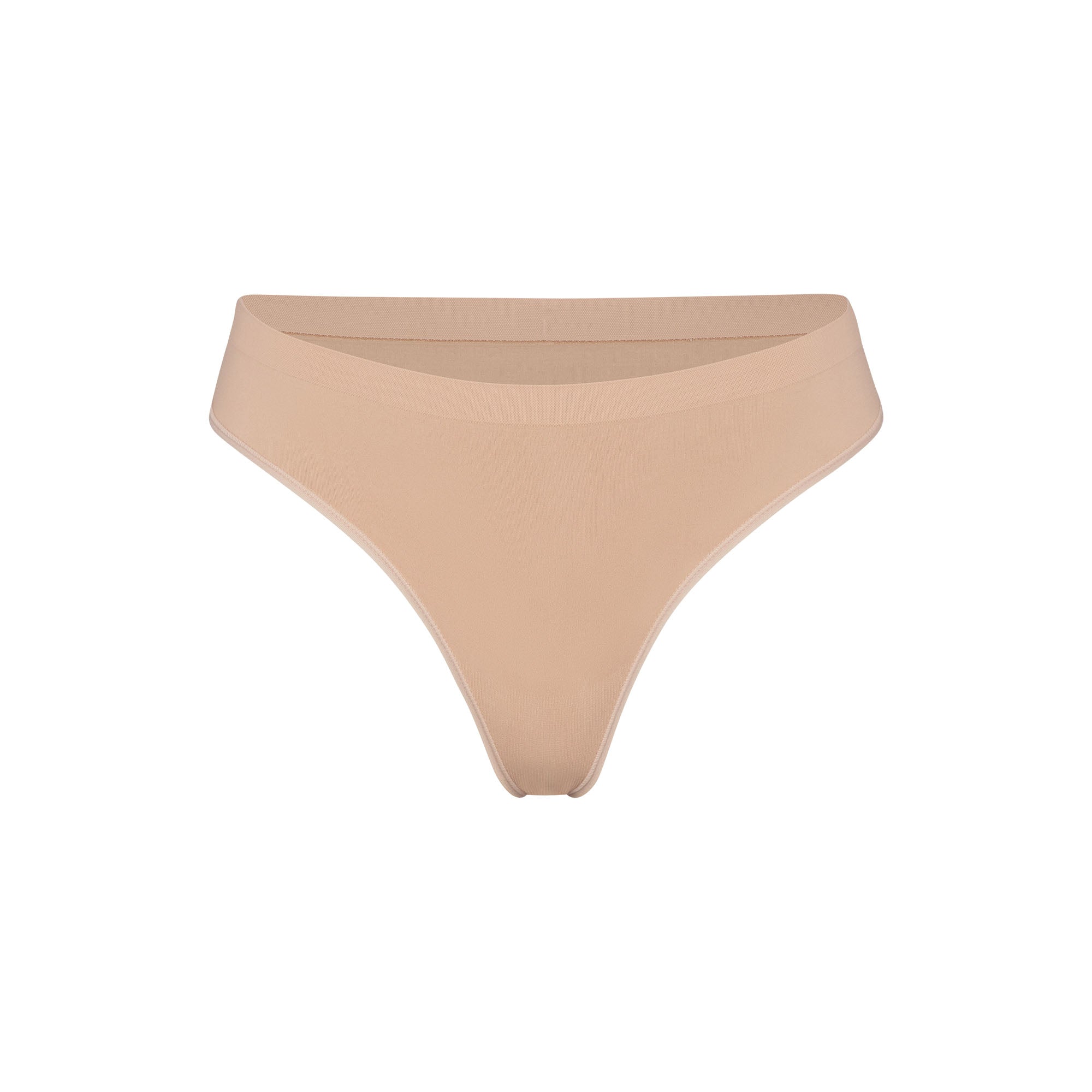 SOFT SMOOTHING SEAMLESS THONG | CLAY (THONGS, PANTIES) LAYS FLAT ON A WHITE BACKGROUND | FLT