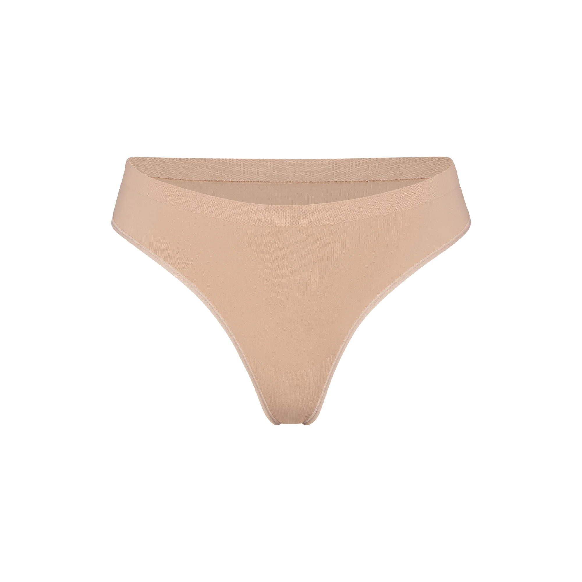 SOFT SMOOTHING SEAMLESS THONG | CLAY (THONGS, PANTIES) LAYS FLAT ON A WHITE BACKGROUND | FLT