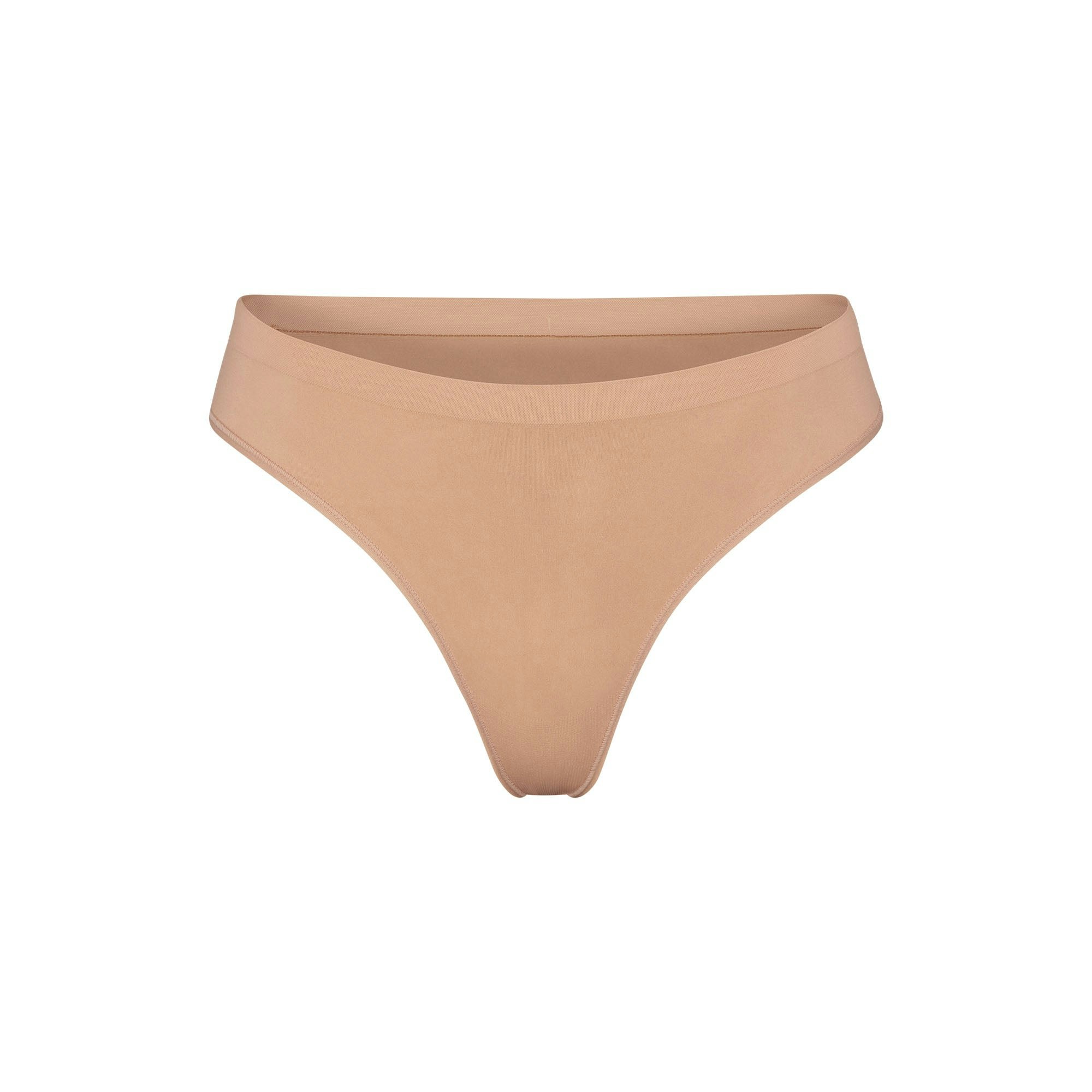 SOFT SMOOTHING SEAMLESS THONG | OCHRE (THONGS, PANTIES) LAYS FLAT ON A WHITE BACKGROUND | FLT
