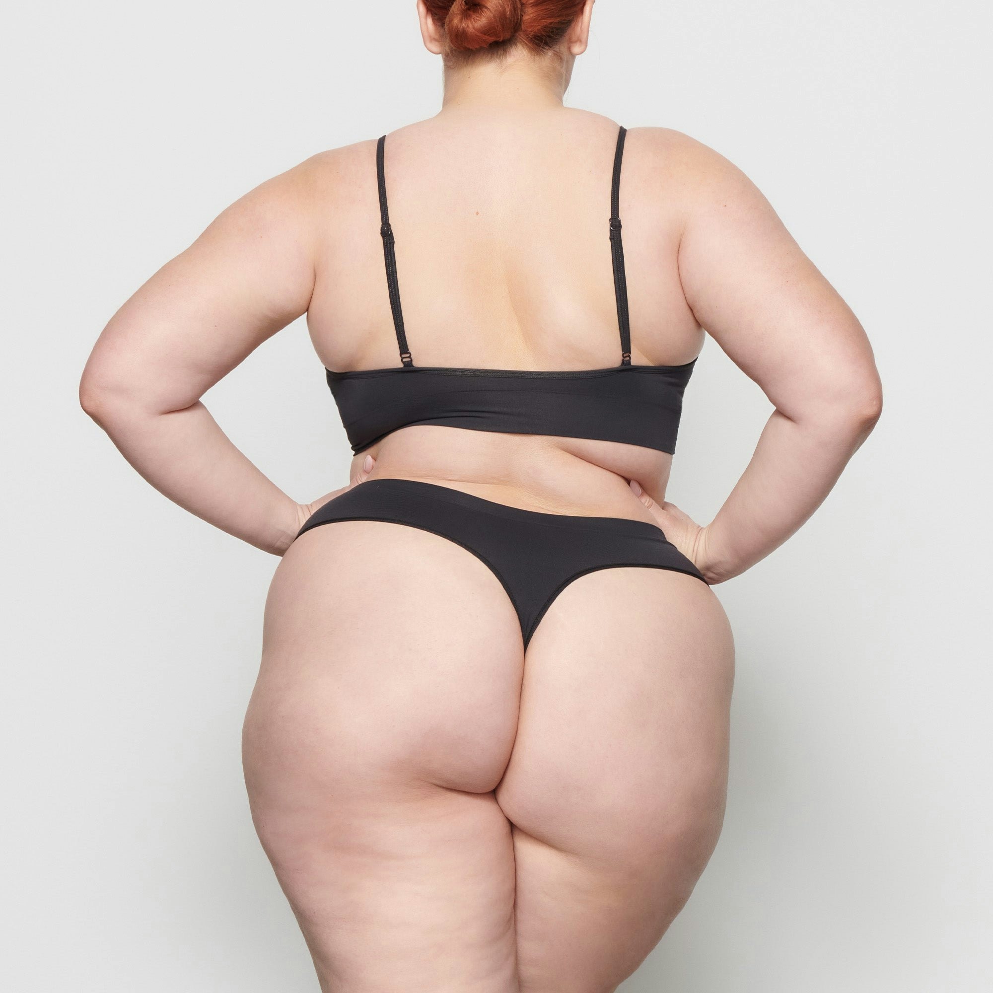 SOFT SMOOTHING THONG WORN BY A MODEL IN BACK VIEW