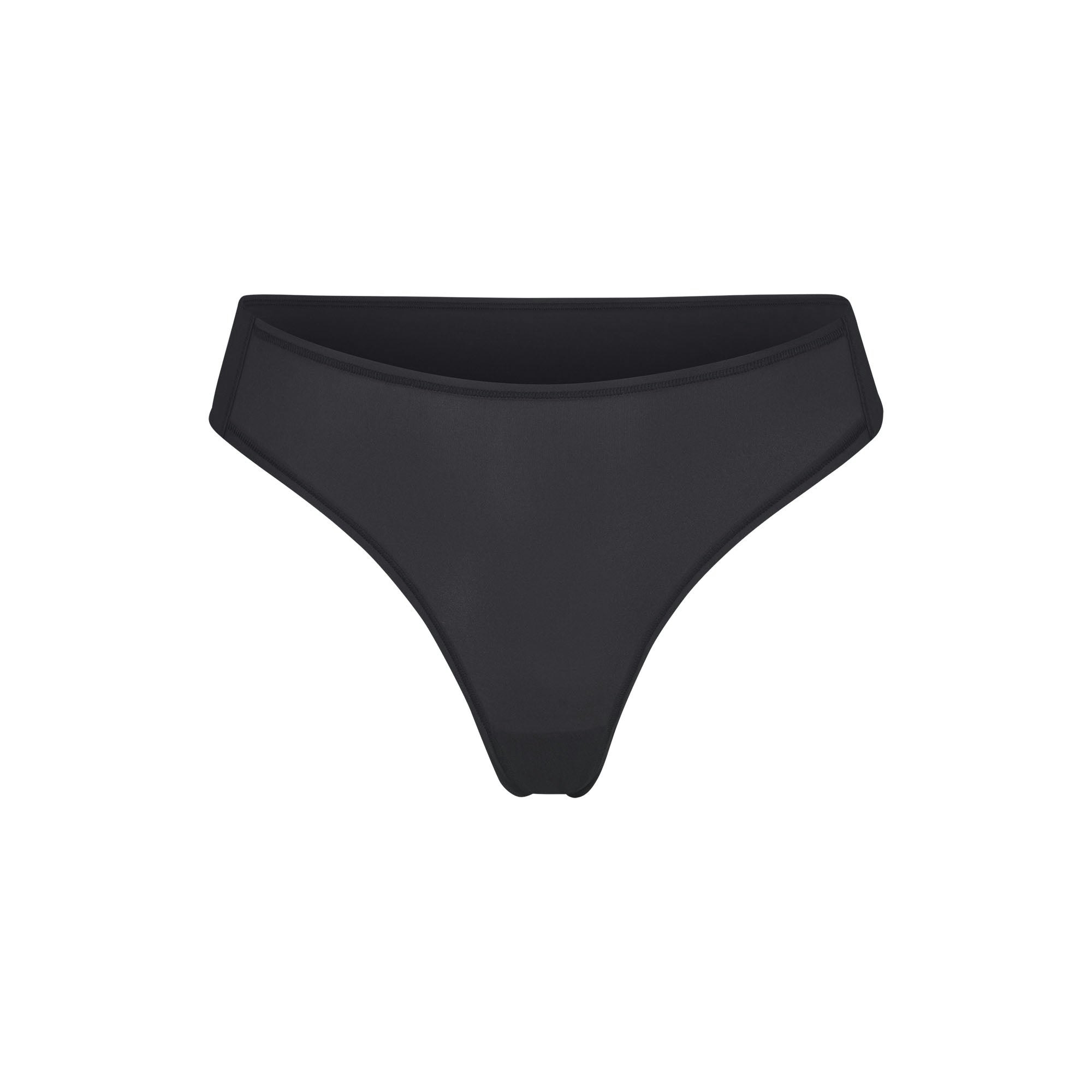 ADAPTIVE FITS EVERYBODY THONG | ONYX (ADAPTIVE PANTIES) LAYS FLAT ON A WHITE BACKGROUND | FLT