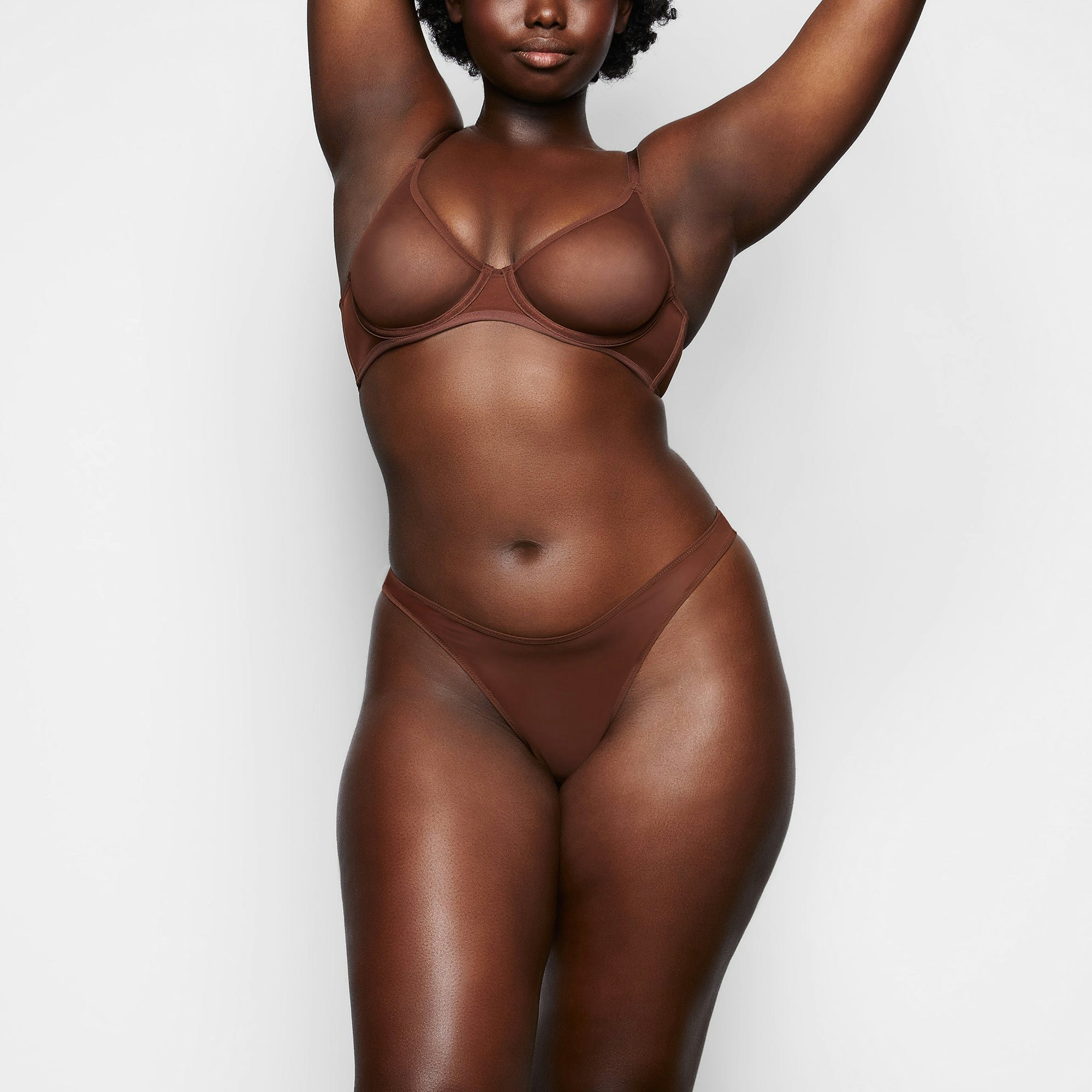 ULTRA FINE MESH THONG WORN BY A MODEL IN FRONT VIEW