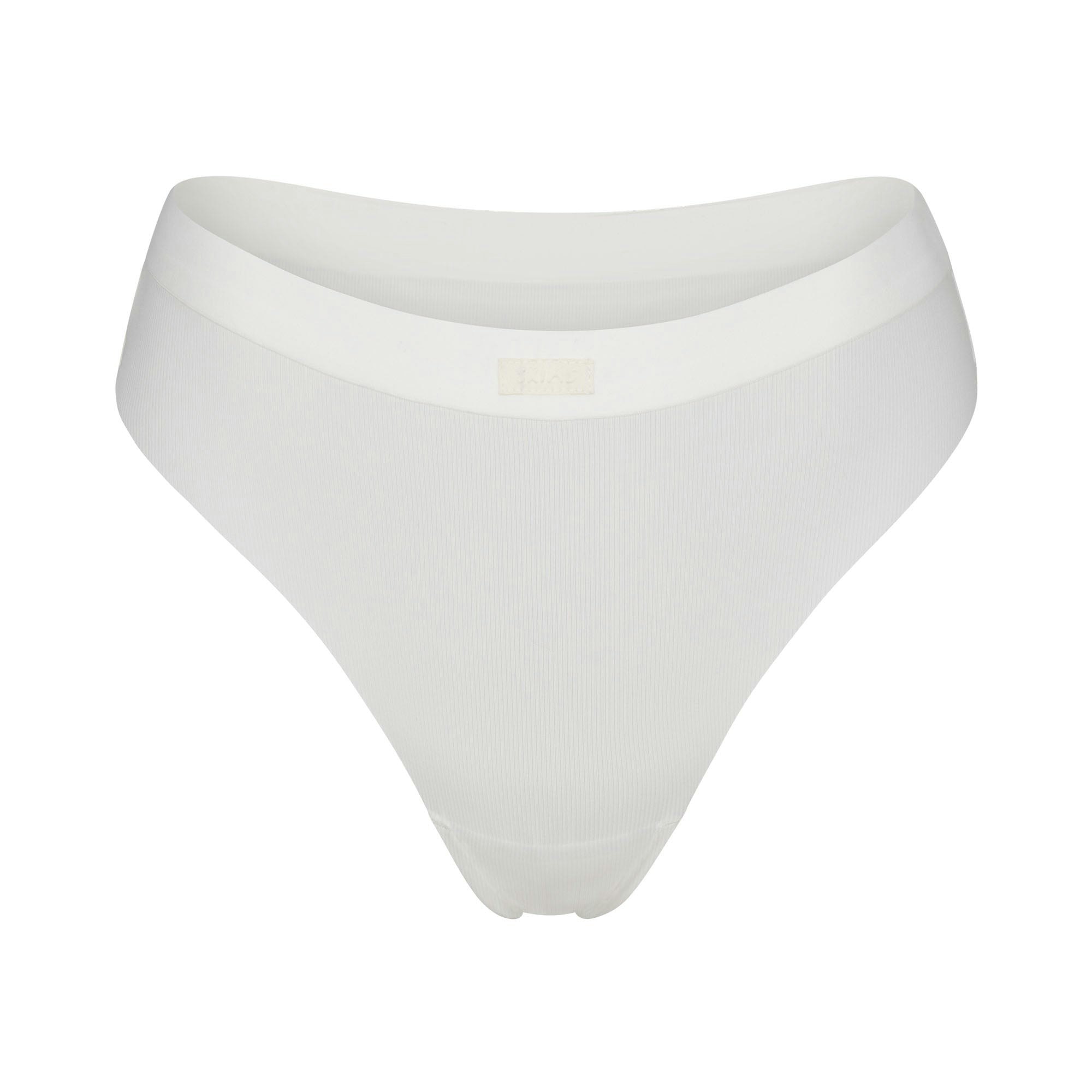 SMOOTH RIB THONG LAYS FLAT ON A WHITE BACKGROUND