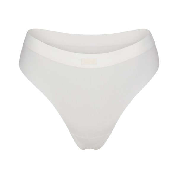SMOOTH RIB THONG LAYS FLAT ON A WHITE BACKGROUND