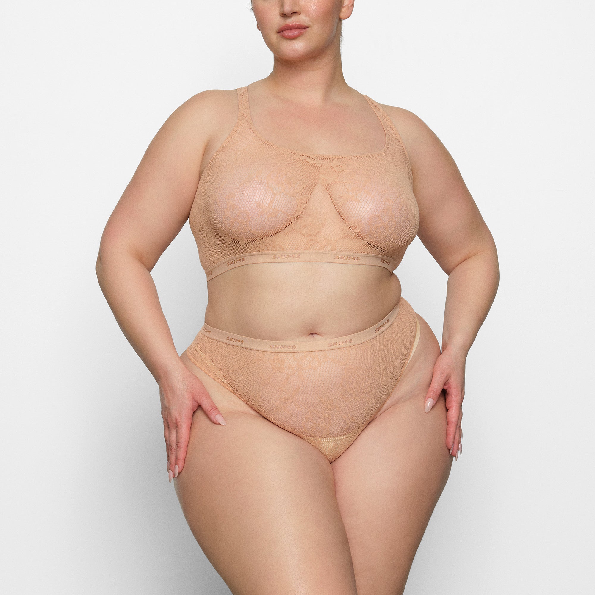 KNIT LACE DIPPED THONG WORN BY A MODEL IN FRONT VIEW | SEE: 2X, 3X, 4X