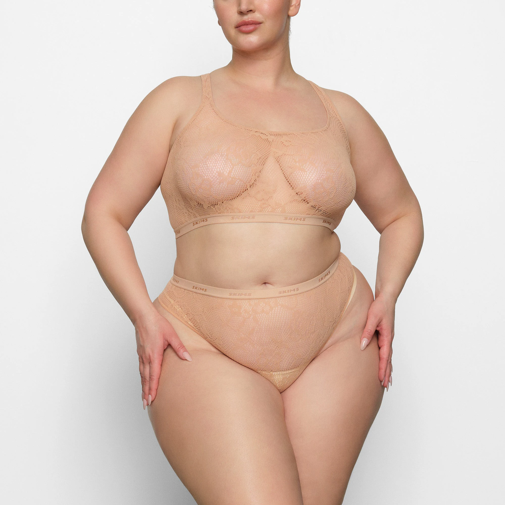 KNIT LACE DIPPED THONG WORN BY A MODEL IN FRONT VIEW | SEE: 2X, 3X, 4X