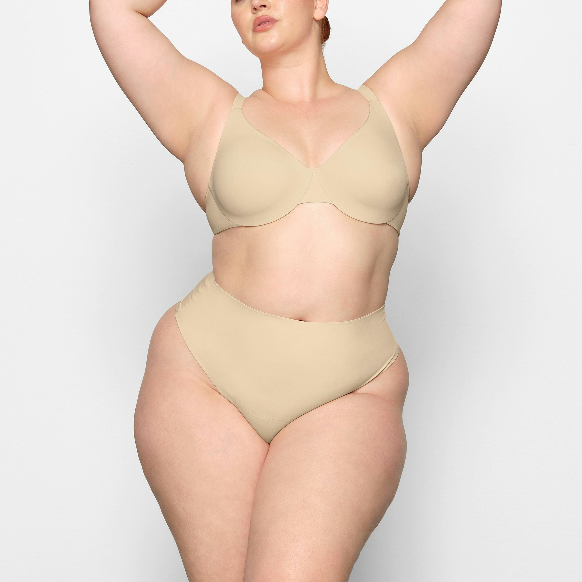 SMOOTHING HIGH WAIST THONG WORN BY A MODEL IN FRONT VIEW | SEE: 2X, 3X, 4X