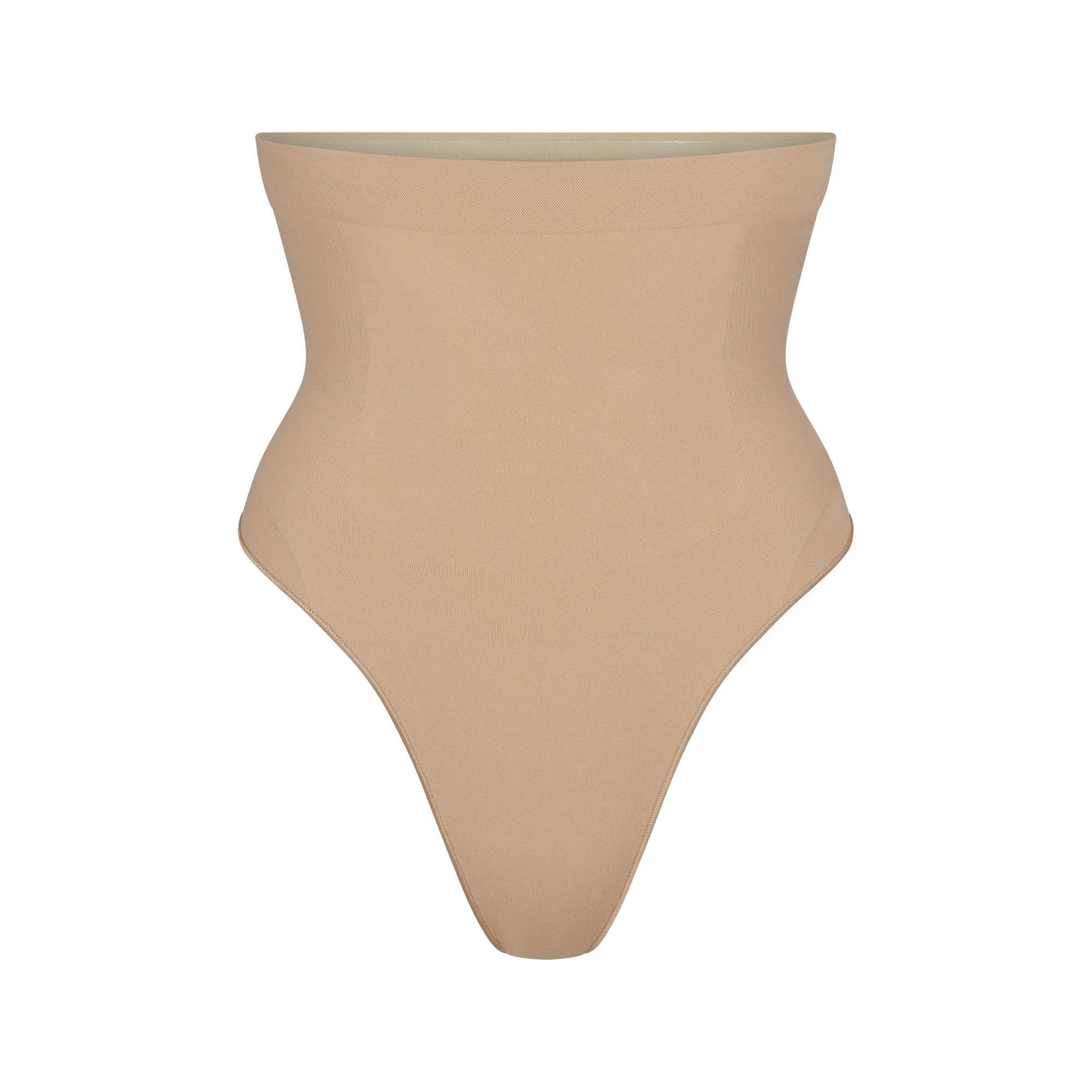 SEAMLESS SCULPT HIGH-WAISTED THONG | CLAY (SHAPEWEAR THONGS, PANTIES) LAYS FLAT ON A WHITE BACKGROUND | FLT