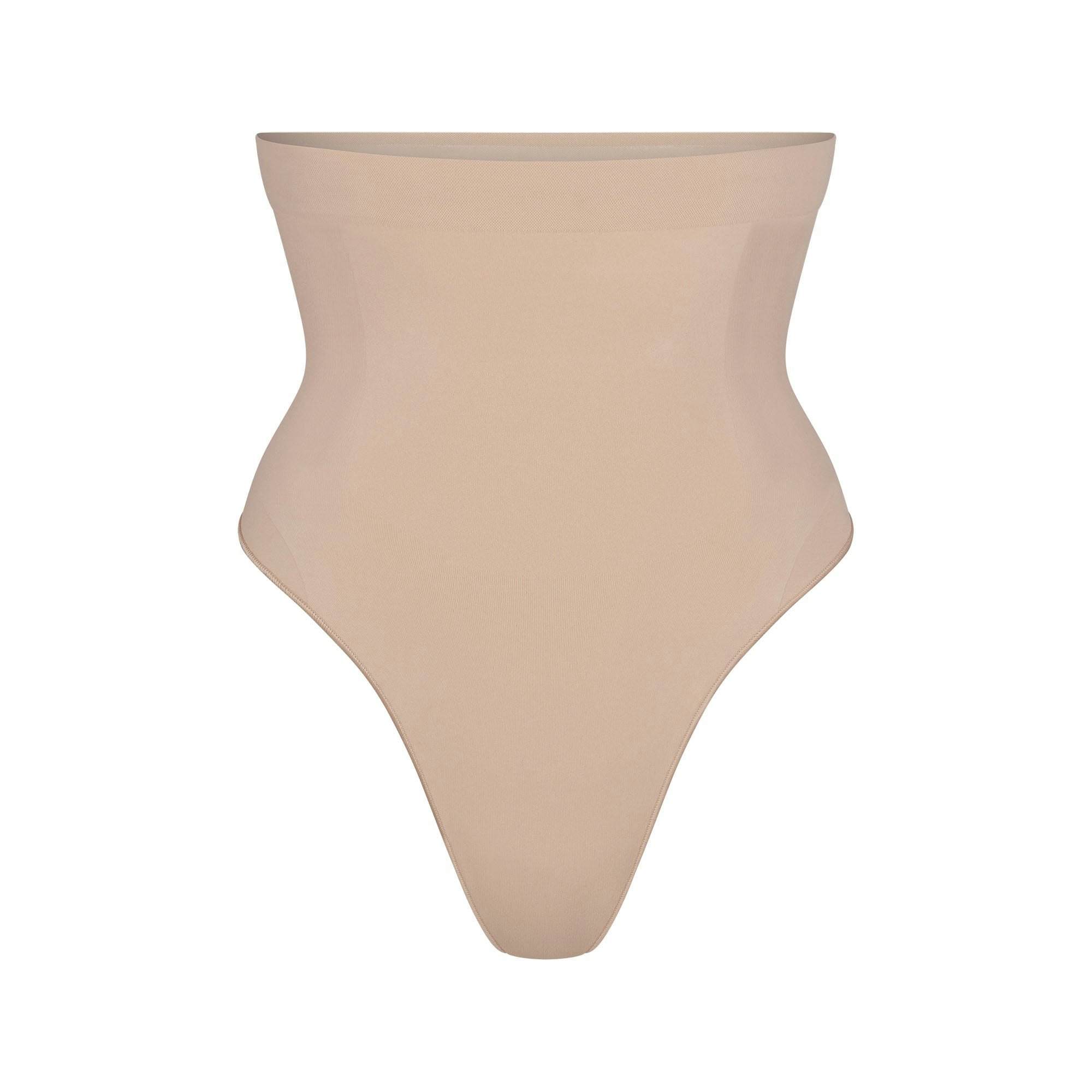 SEAMLESS SCULPT HIGH-WAISTED THONG | MICA (SHAPEWEAR THONGS, PANTIES) LAYS FLAT ON A WHITE BACKGROUND | FLT