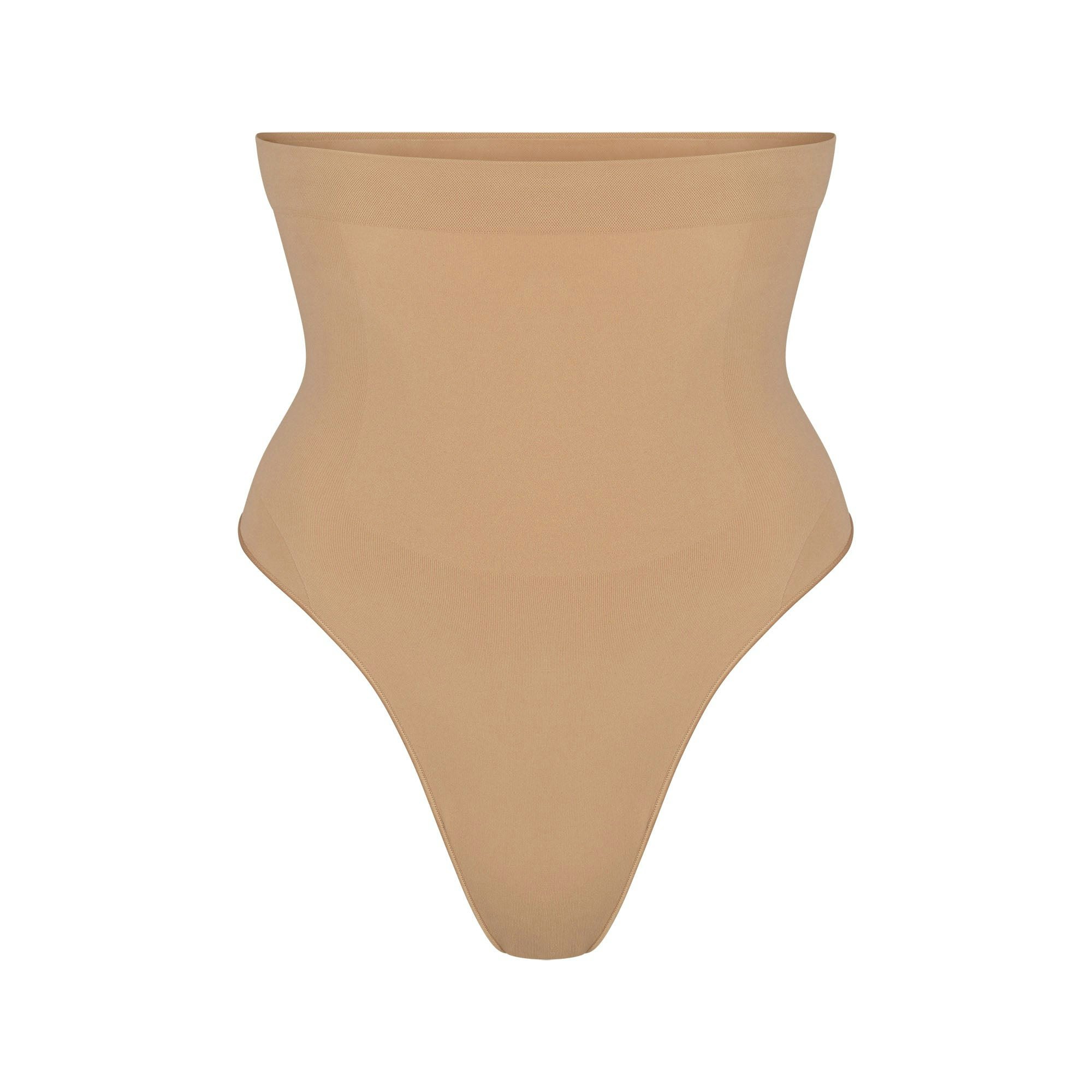 SEAMLESS SCULPT HIGH-WAISTED THONG | OCHRE (SHAPEWEAR THONGS, PANTIES) LAYS FLAT ON A WHITE BACKGROUND | FLT