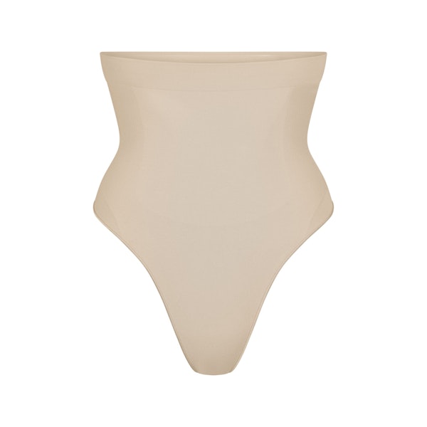 SEAMLESS SCULPT HIGH-WAISTED THONG | SAND (SHAPEWEAR THONGS, PANTIES) LAYS FLAT ON A WHITE BACKGROUND | FLT