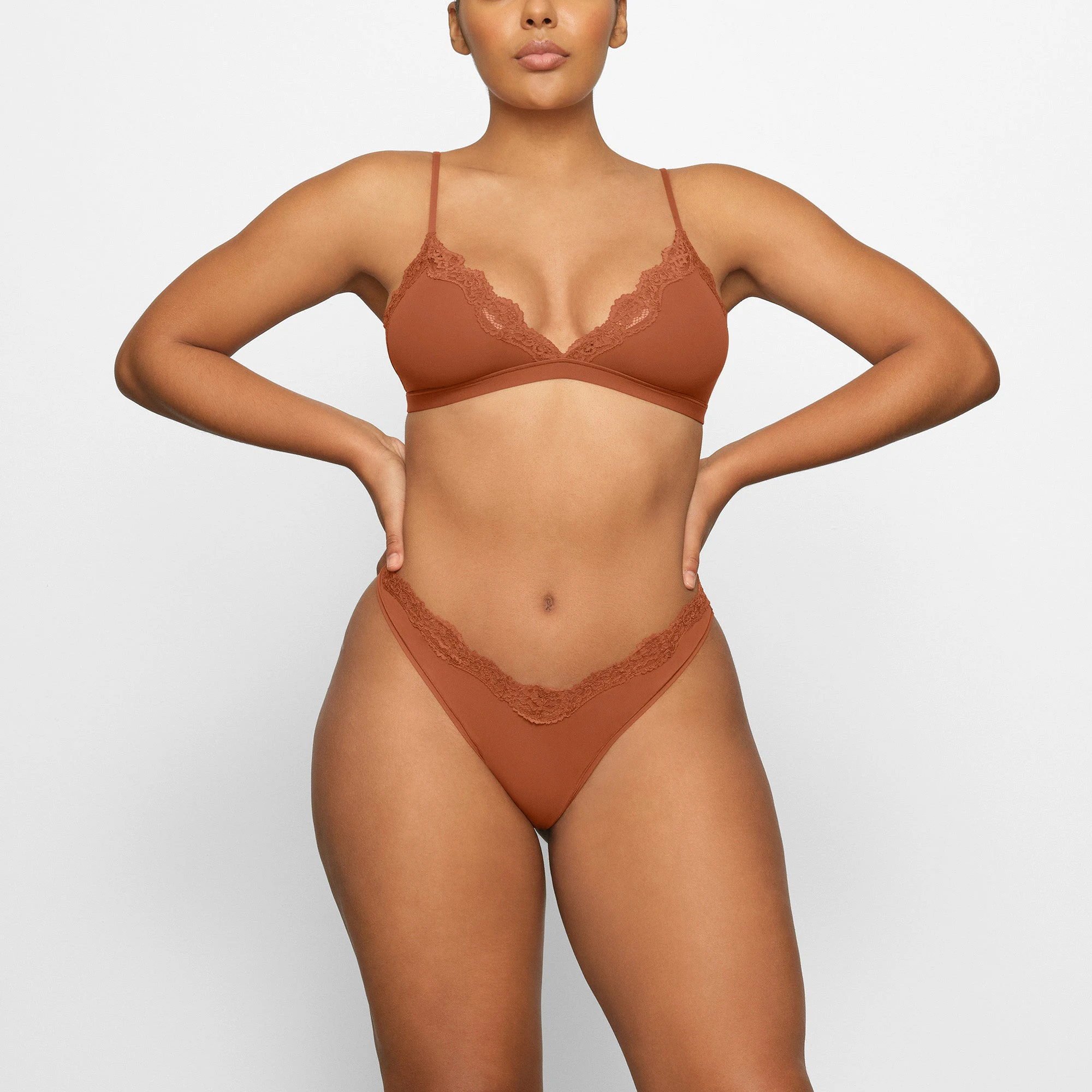 FITS EVERYBODY LACE DIPPED THONG WORN BY A MODEL IN FRONT VIEW | SEE: M, L, XL