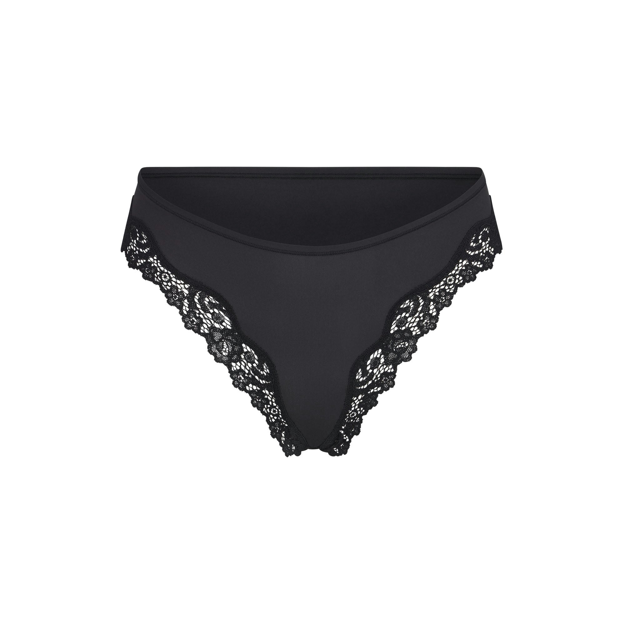 FITS EVERYBODY LACE TANGA | ONYX (TANGAS, PANTIES) LAYS FLAT ON A WHITE BACKGROUND | FLT