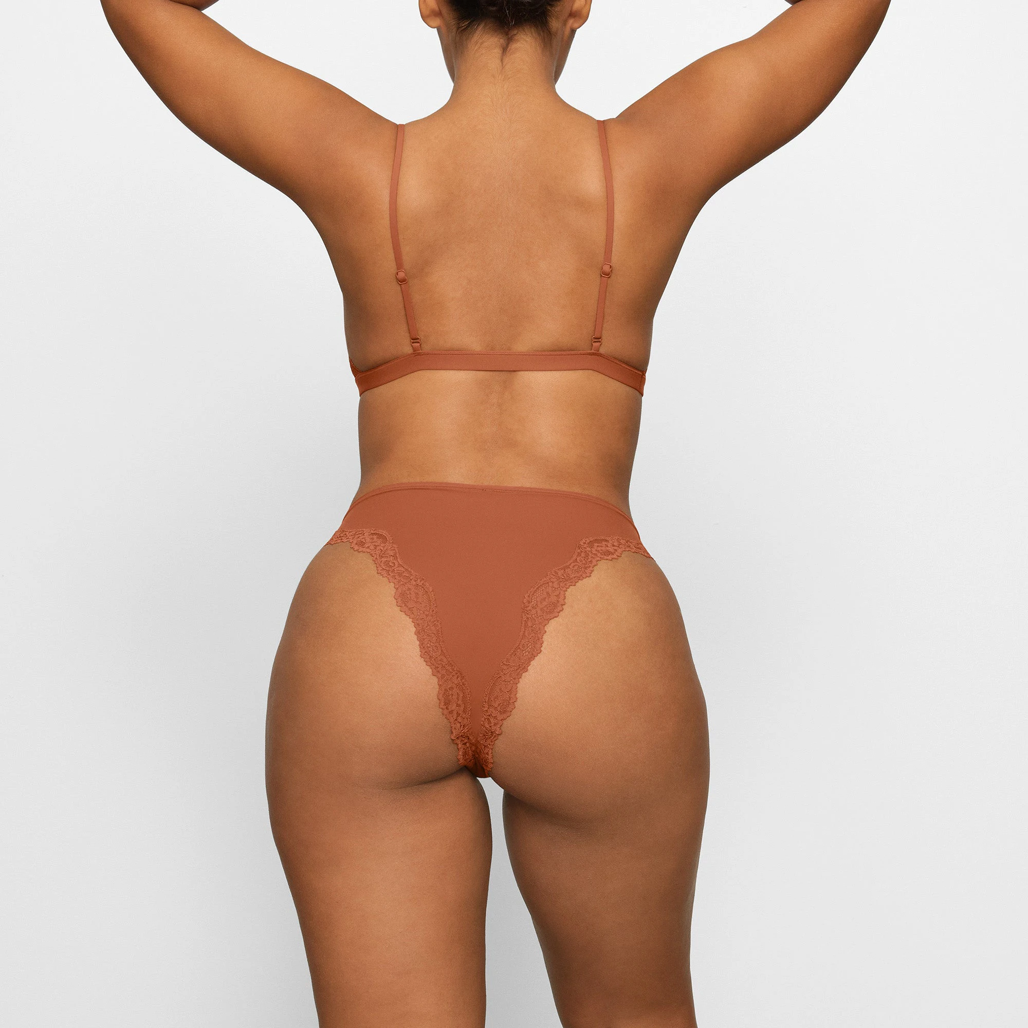 FITS EVERYBODY LACE TANGA WORN BY A MODEL IN BACK VIEW