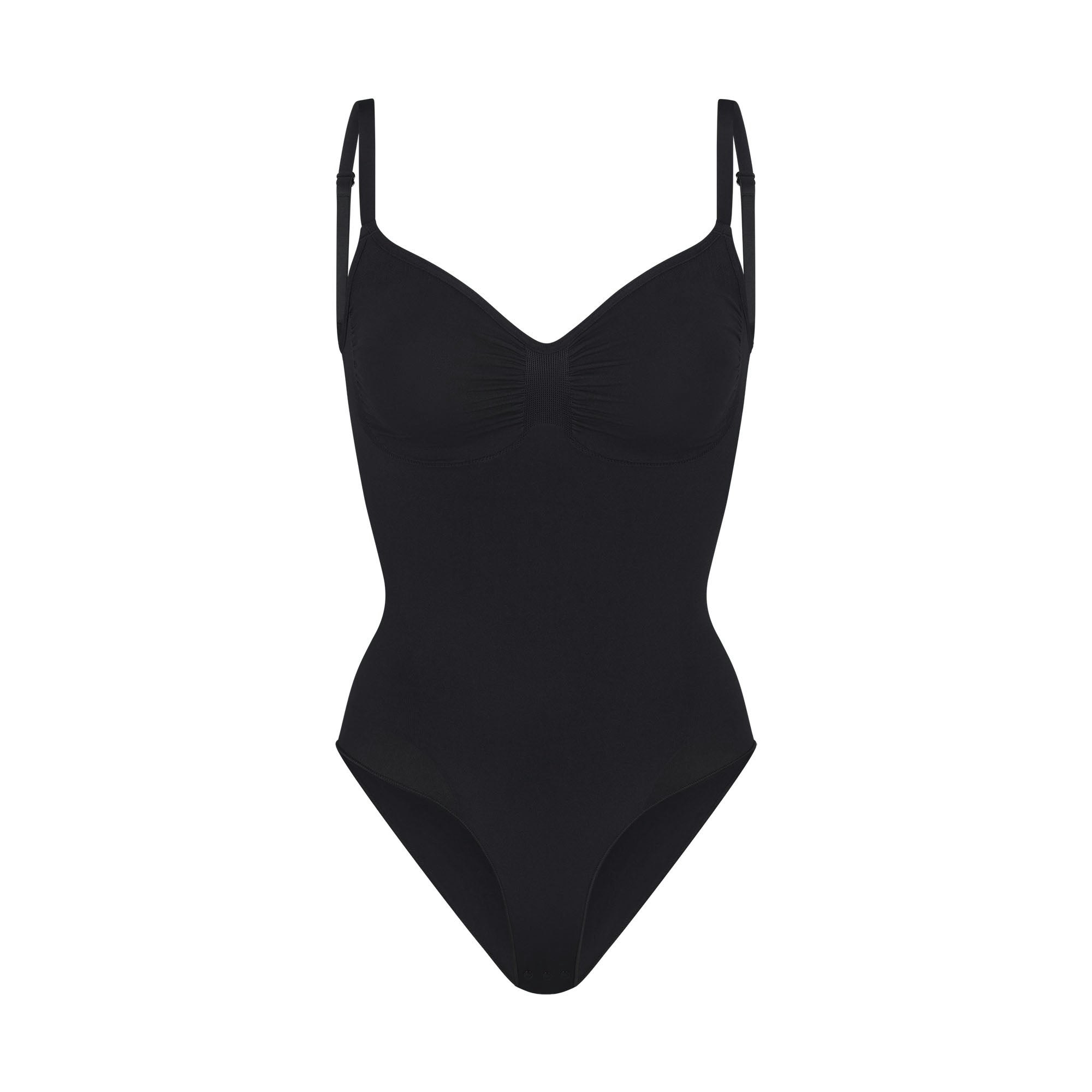 SEAMLESS SCULPT BRIEF BODYSUIT | ONYX (SHAPEWEAR BODYSUITS) LAYS FLAT ON A WHITE BACKGROUND | FLT | FLT