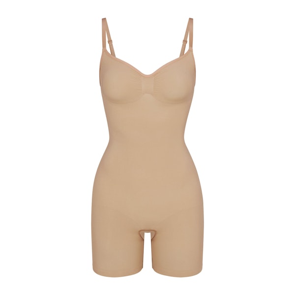 SEAMLESS SCULPT MID THIGH BODYSUIT | CLAY (ONESIES, BODYSUITS) LAYS FLAT ON A WHITE BACKGROUND | FLT