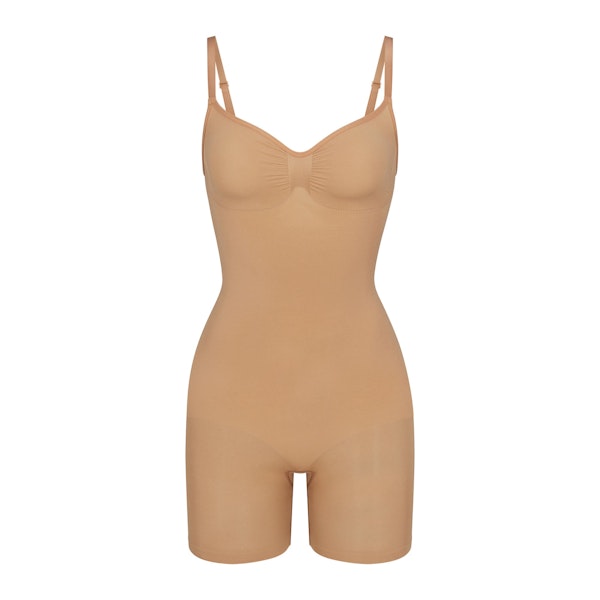 SEAMLESS SCULPT MID THIGH BODYSUIT | OCHRE (ONESIES, BODYSUITS) LAYS FLAT ON A WHITE BACKGROUND | FLT