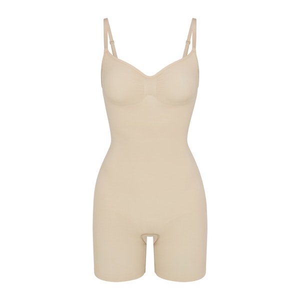 SEAMLESS SCULPT MID THIGH BODYSUIT | SAND (ONESIES, BODYSUITS) LAYS FLAT ON A WHITE BACKGROUND | FLT