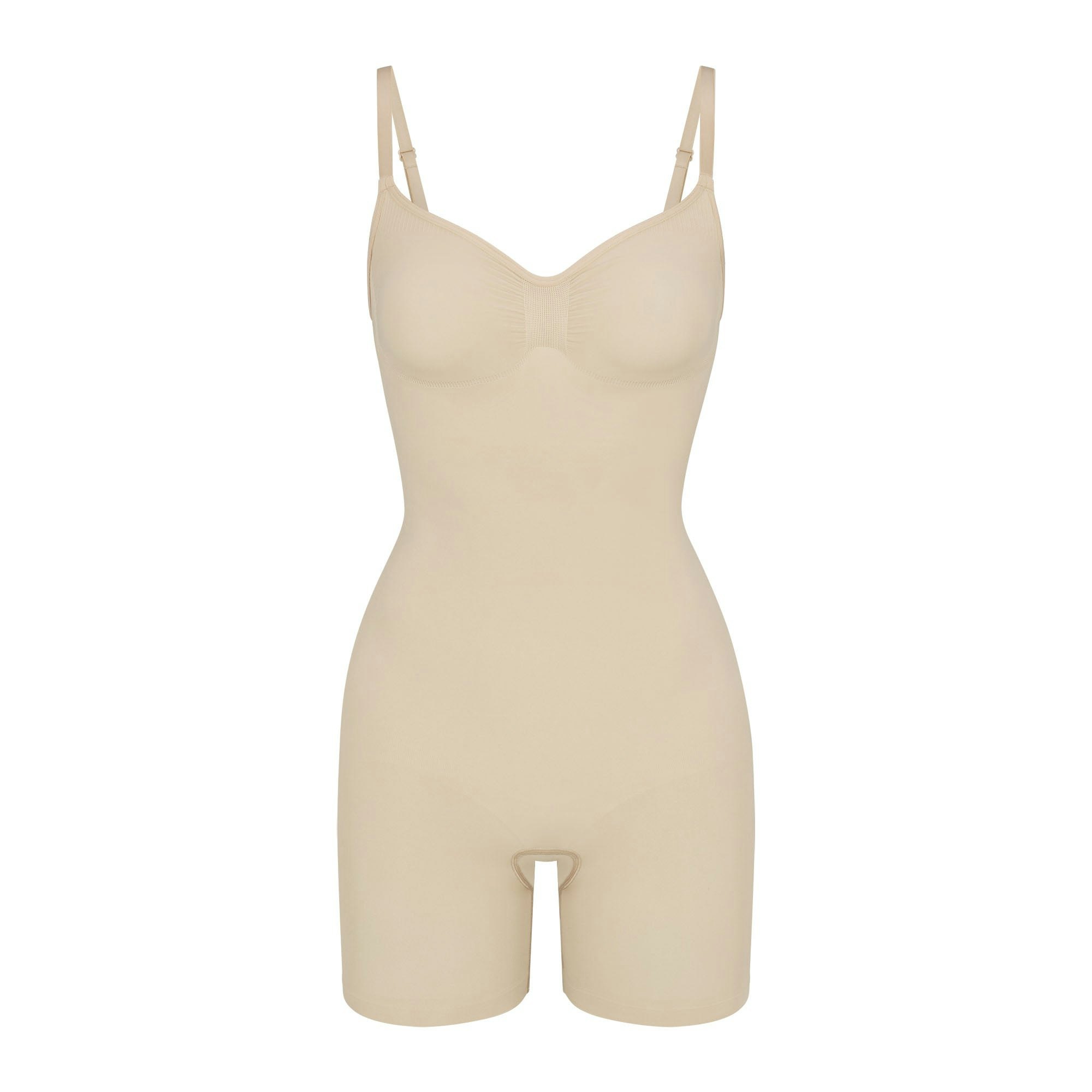 SEAMLESS SCULPT MID THIGH BODYSUIT | SAND (ONESIES, BODYSUITS) LAYS FLAT ON A WHITE BACKGROUND | FLT