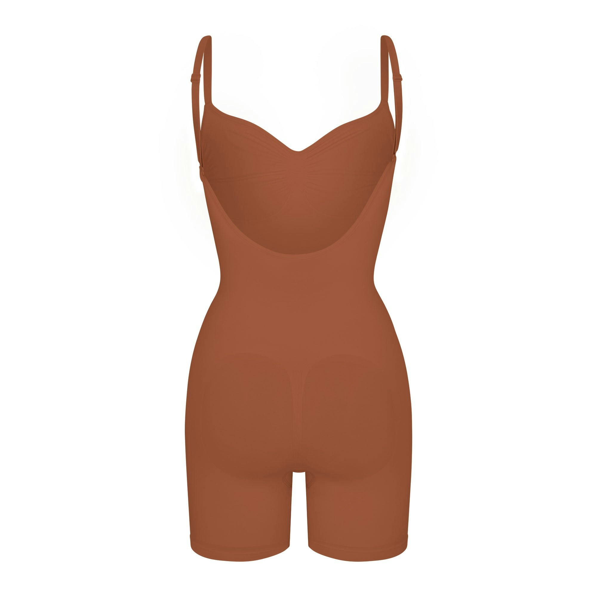 SEAMLESS SCULPT LOW BACK MID THIGH BODYSUIT LAYS FLAT ON A WHITE BACKGROUND
