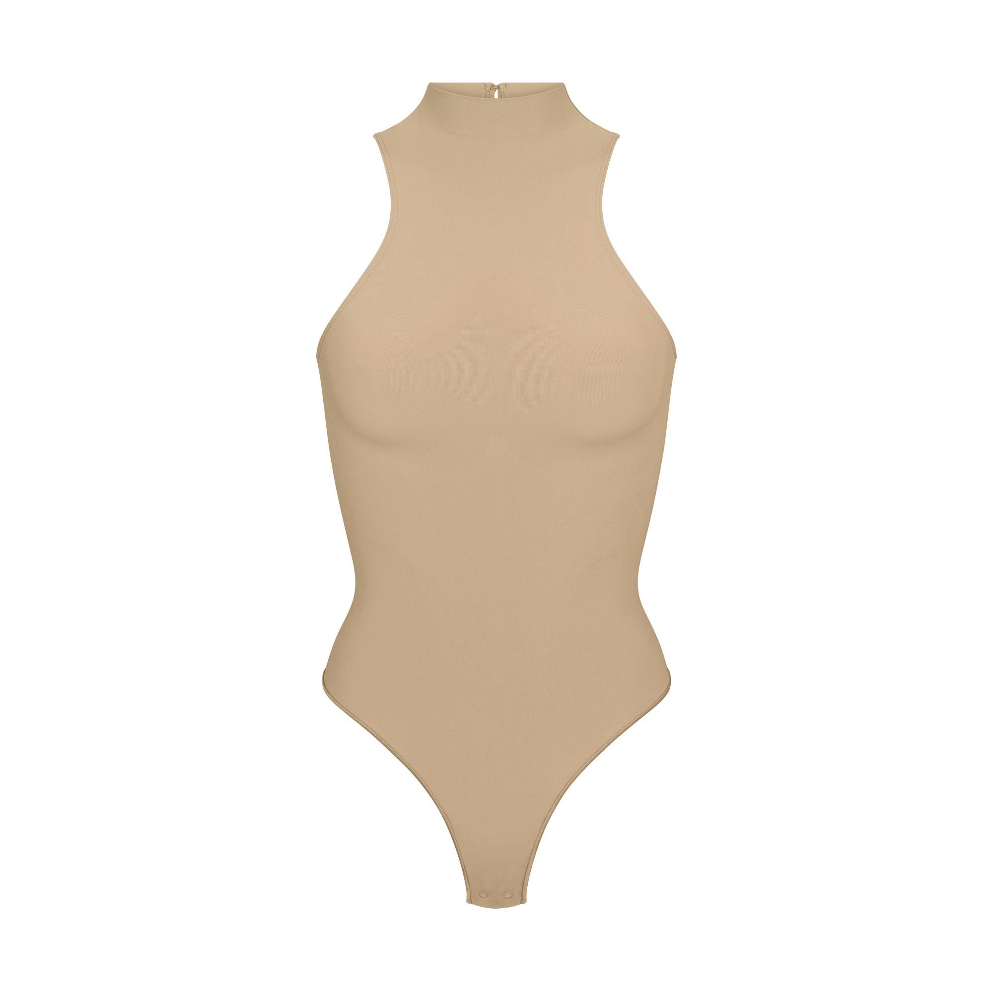 SEAMLESS SCULPT HIGH NECK THONG BODYSUIT LAYS FLAT ON A WHITE BACKGROUND