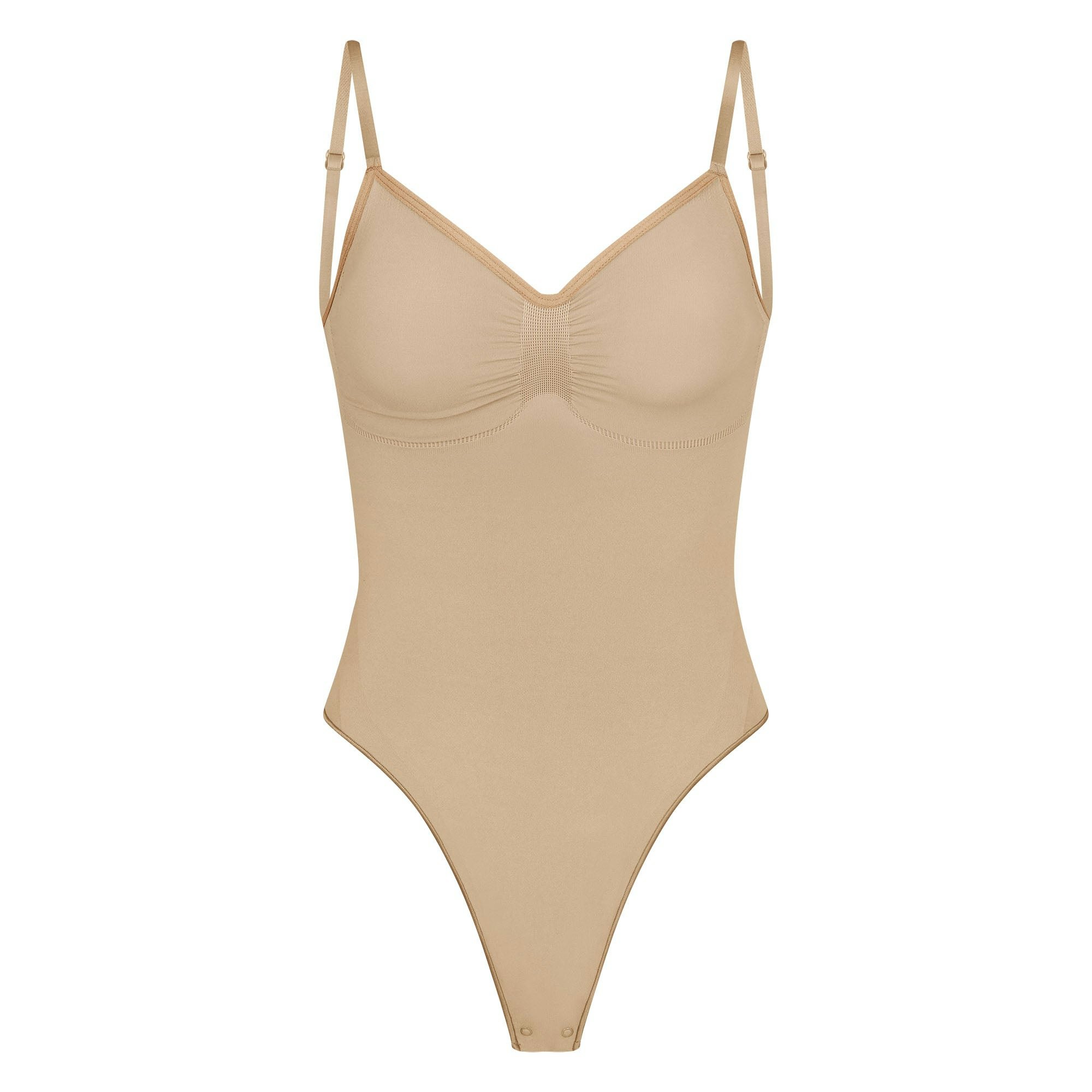 SEAMLESS SCULPT LOW BACK THONG BODYSUIT | CLAY (LOW BACK SHAPEWEAR, BODYSUITS) LAYS FLAT ON A WHITE BACKGROUND | FLT