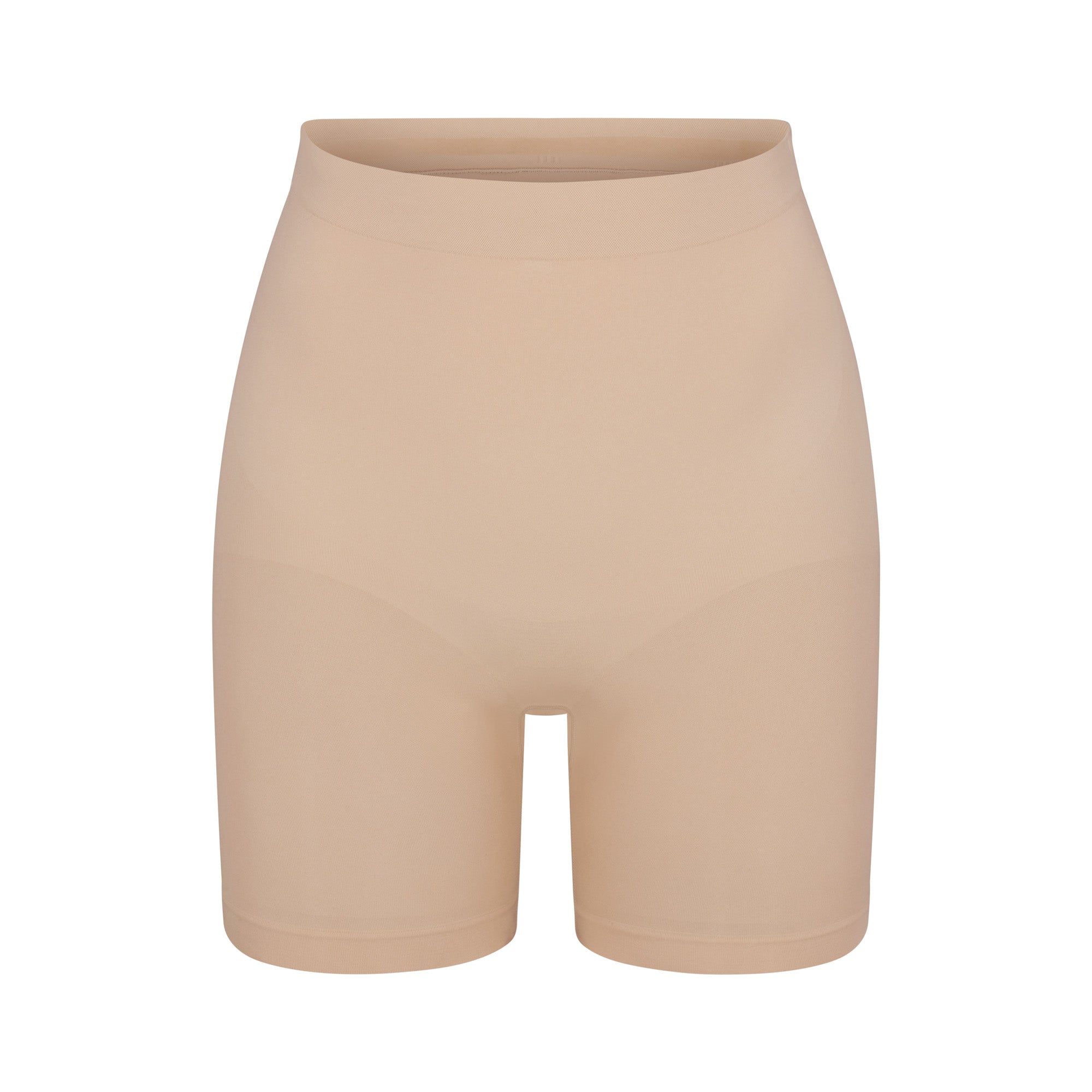 SEAMLESS SCULPT MID THIGH SHORT | MICA (SHAPEWEAR SHORTS, SHAPEWEAR) LAYS FLAT ON A WHITE BACKGROUND | FLT