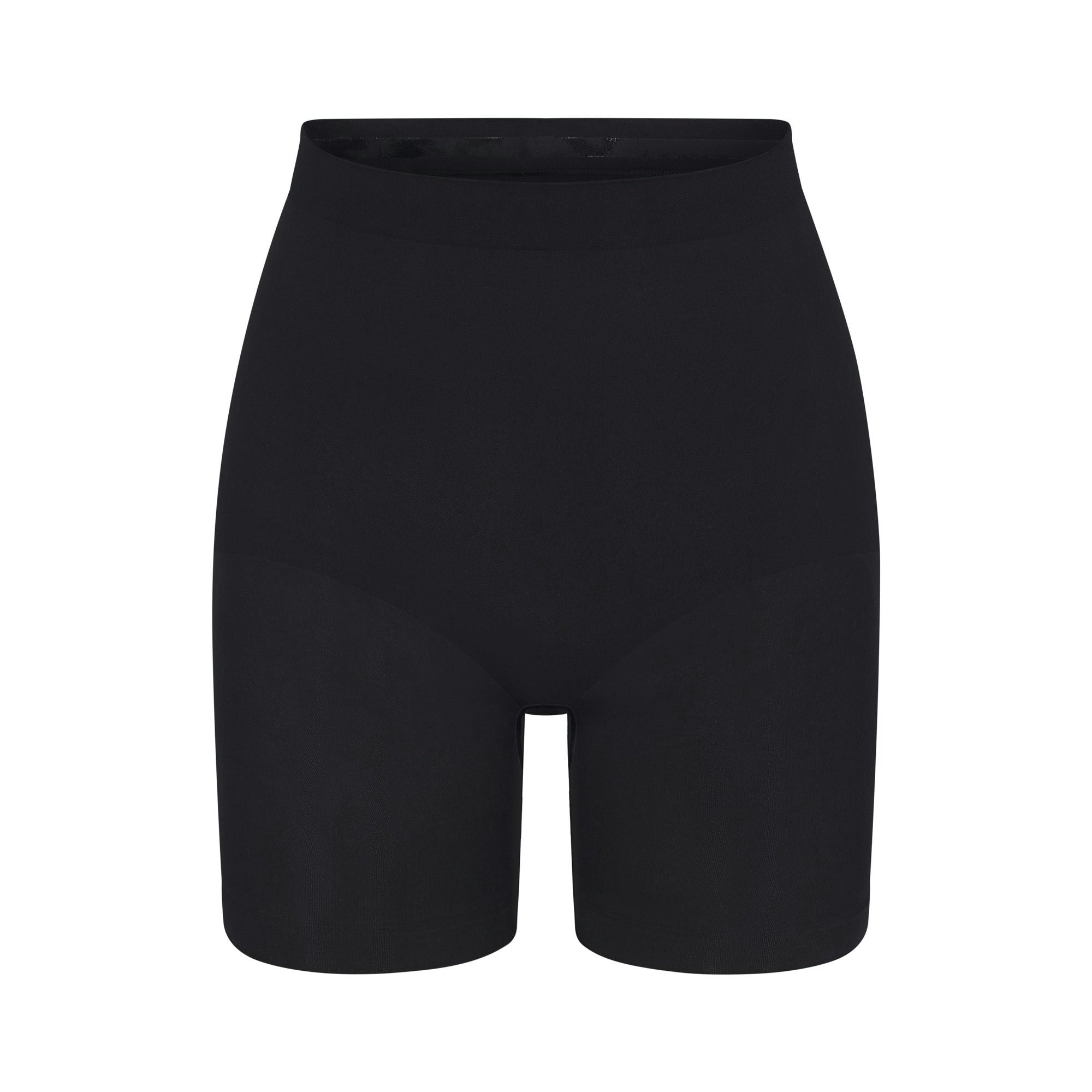 SEAMLESS SCULPT MID THIGH SHORT | ONYX (SHAPEWEAR SHORTS, SHAPEWEAR) LAYS FLAT ON A WHITE BACKGROUND | FLT