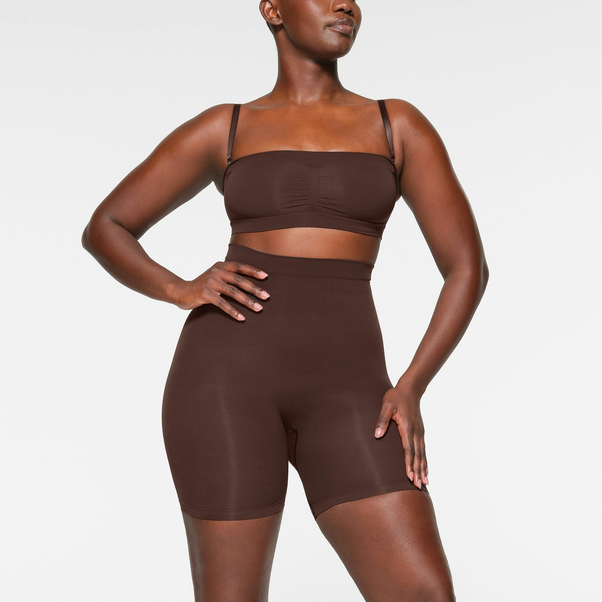 SEAMLESS SCULPT BANDEAU WORN BY A MODEL IN FRONT VIEW