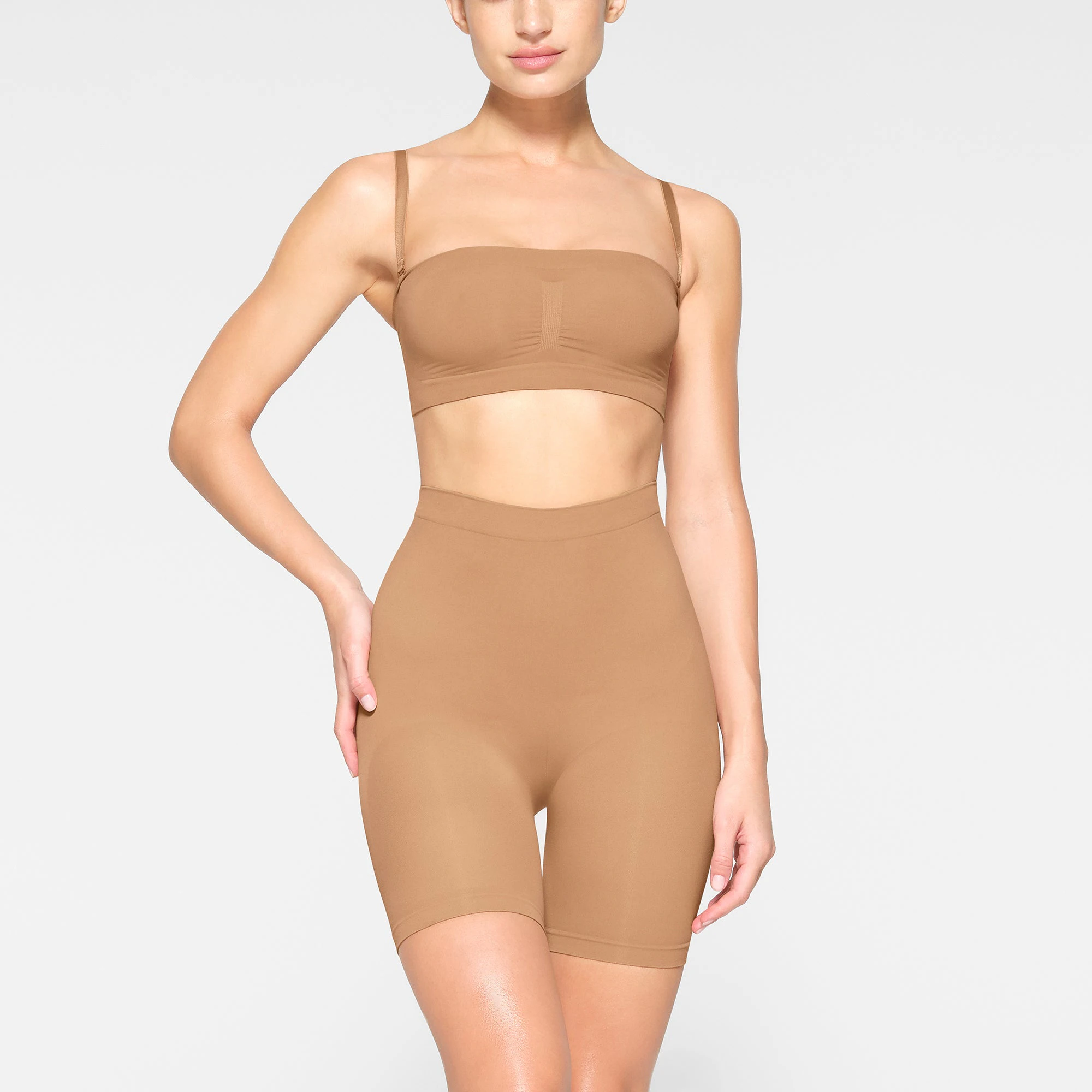 SEAMLESS SCULPT BANDEAU WORN BY A MODEL IN FRONT VIEW