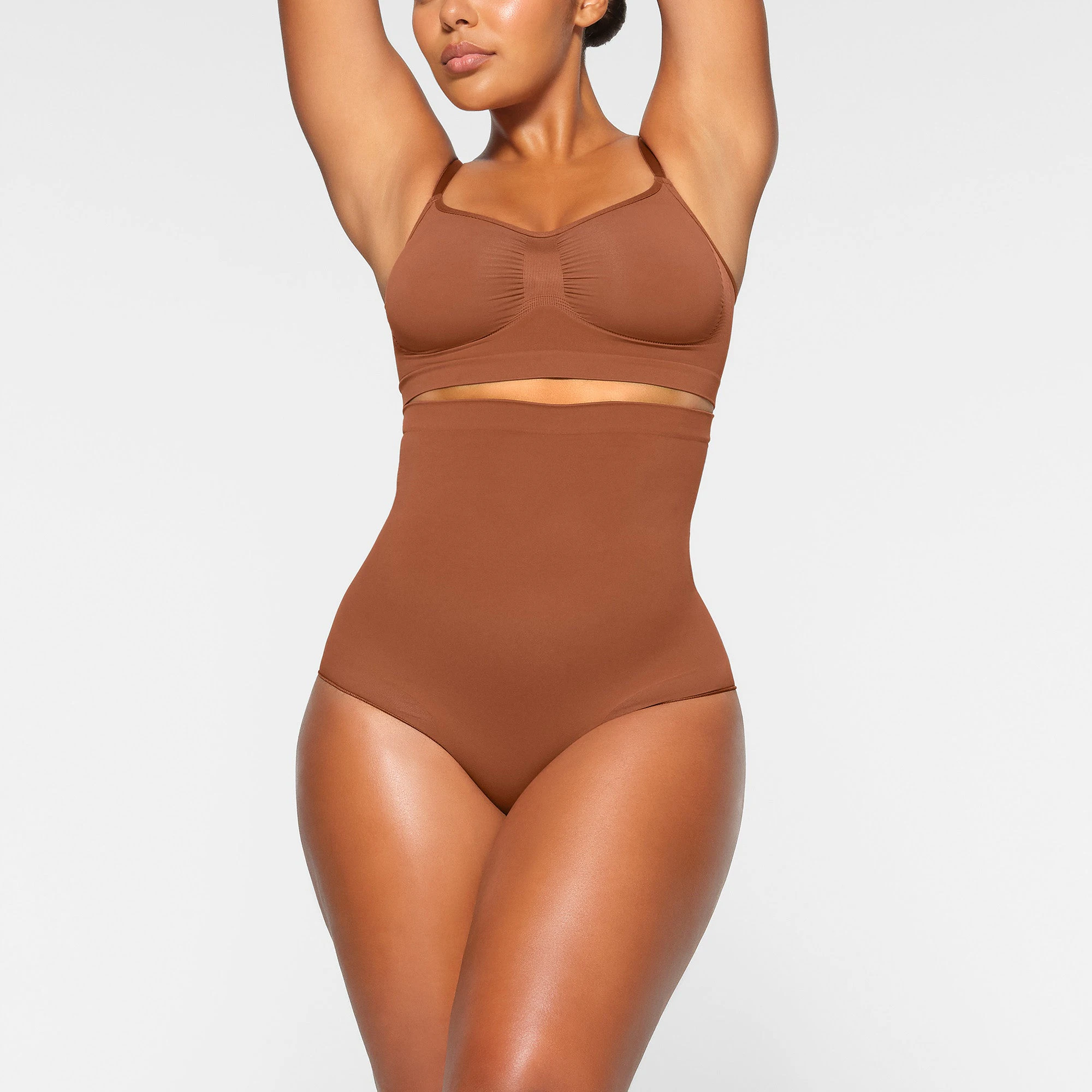 SEAMLESS SCULPT HIGH-WAISTED BRIEF WORN BY A MODEL IN FRONT VIEW | SEE: M, L, XL