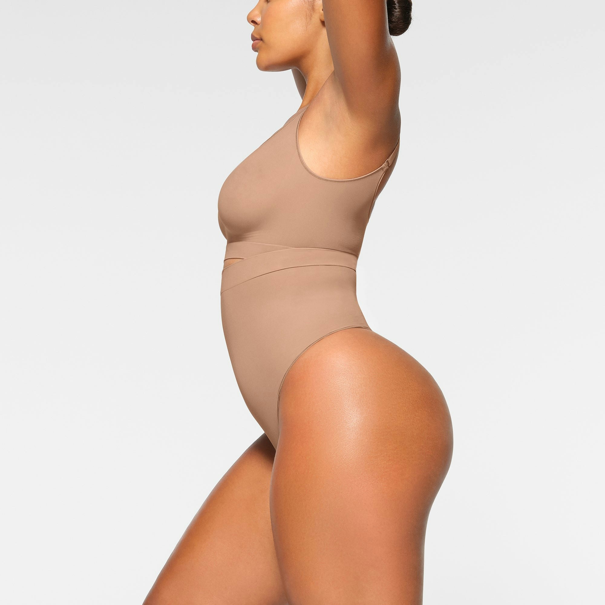 EVERYDAY SCULPT HIGH-WAISTED THONG WORN BY A MODEL IN SIDE VIEW