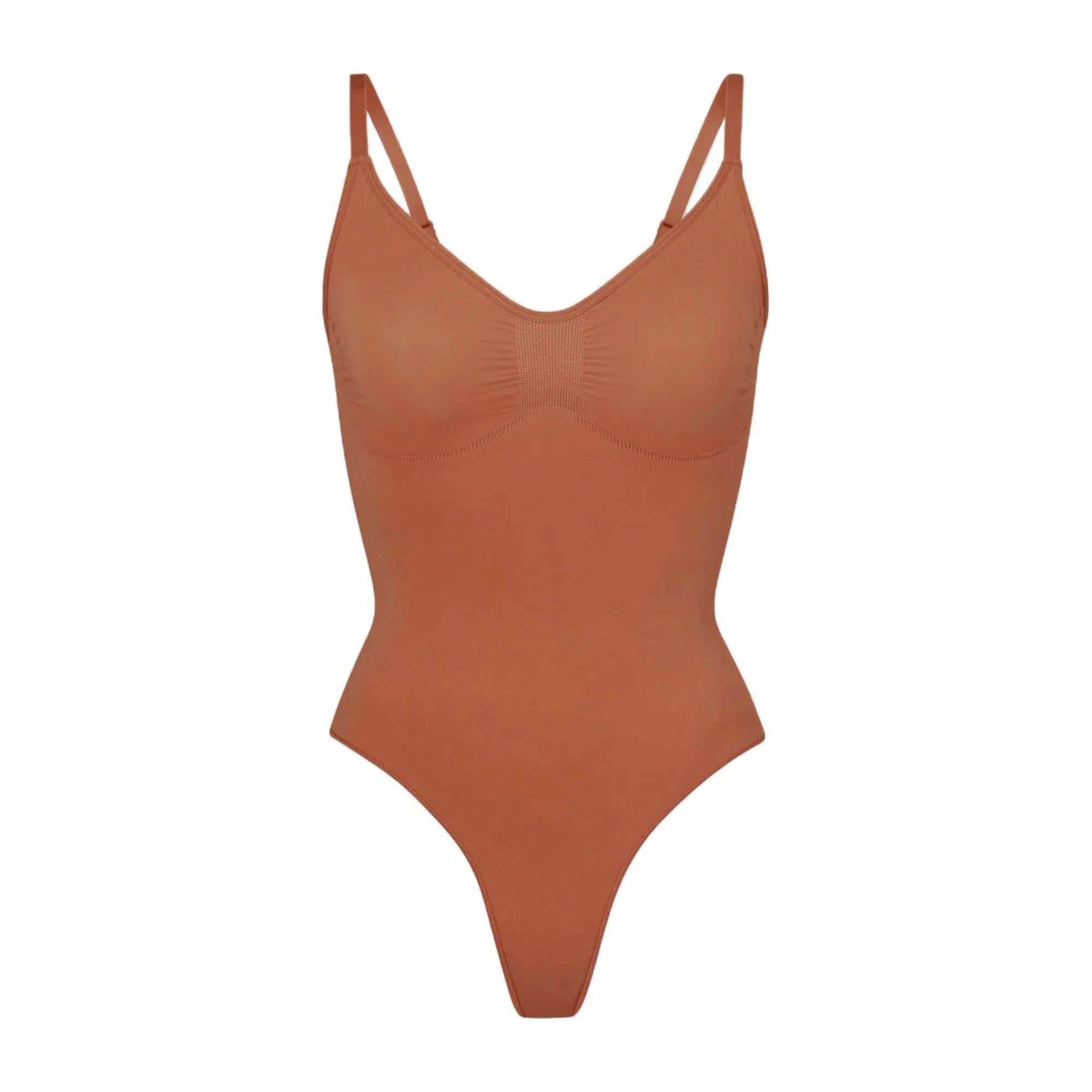 SEAMLESS SCULPT THONG BODYSUIT | BRONZE (SHAPEWEAR BODYSUITS) LAYS FLAT ON A WHITE BACKGROUND | FLT