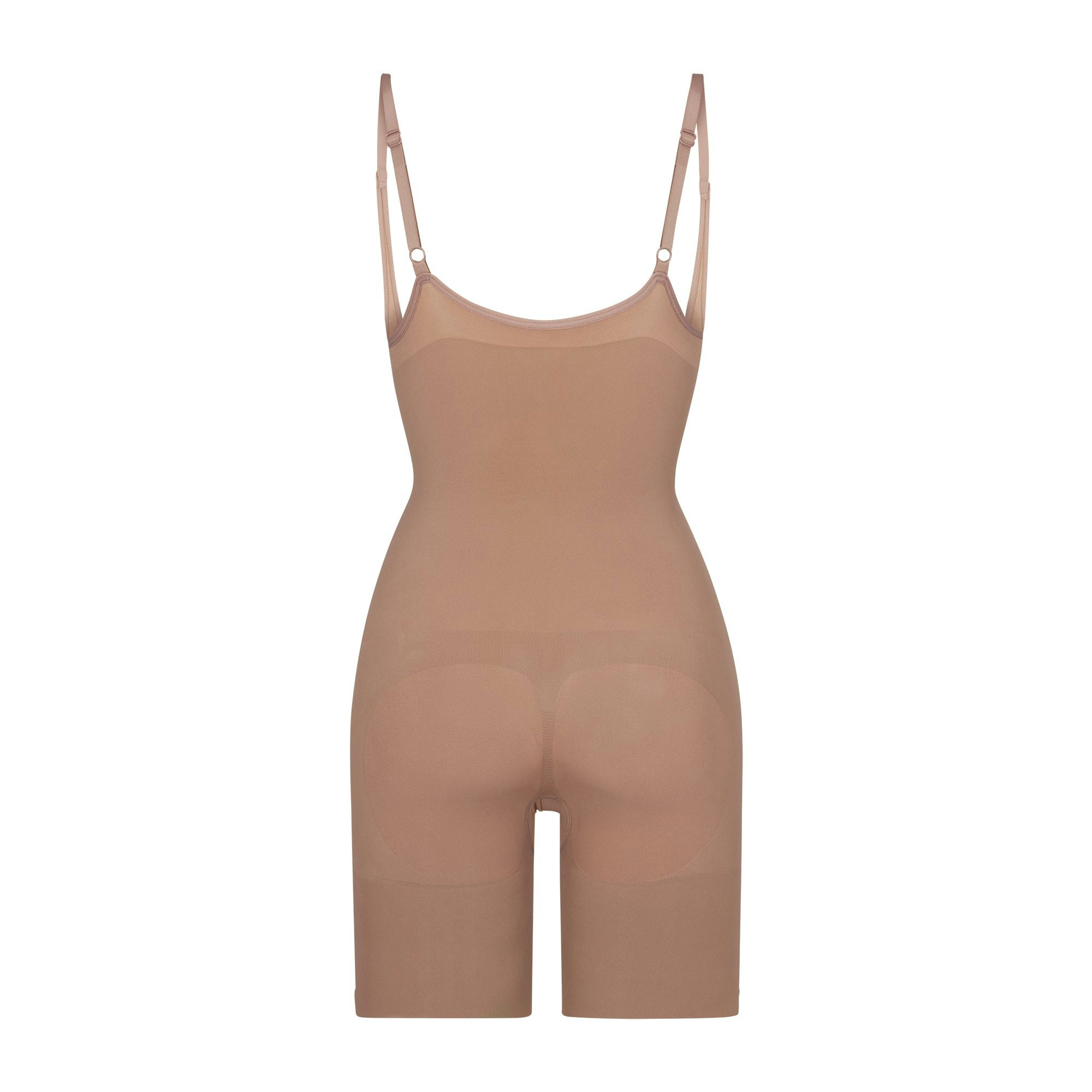 BUTT ENHANCING OPEN BUST BODYSUIT LAYS FLAT ON A WHITE BACKGROUND | FLT