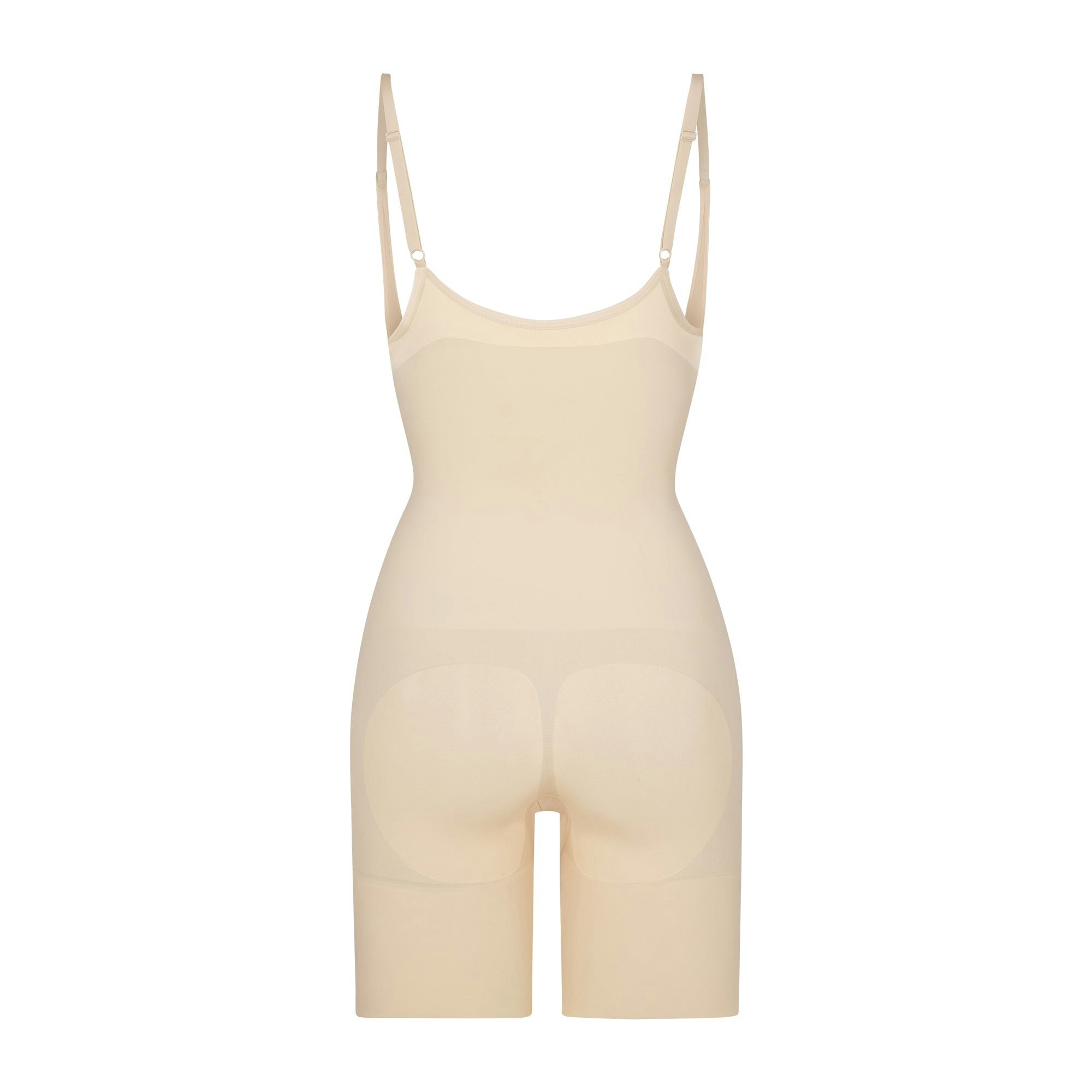 BUTT ENHANCING OPEN BUST BODYSUIT LAYS FLAT ON A WHITE BACKGROUND | FLT