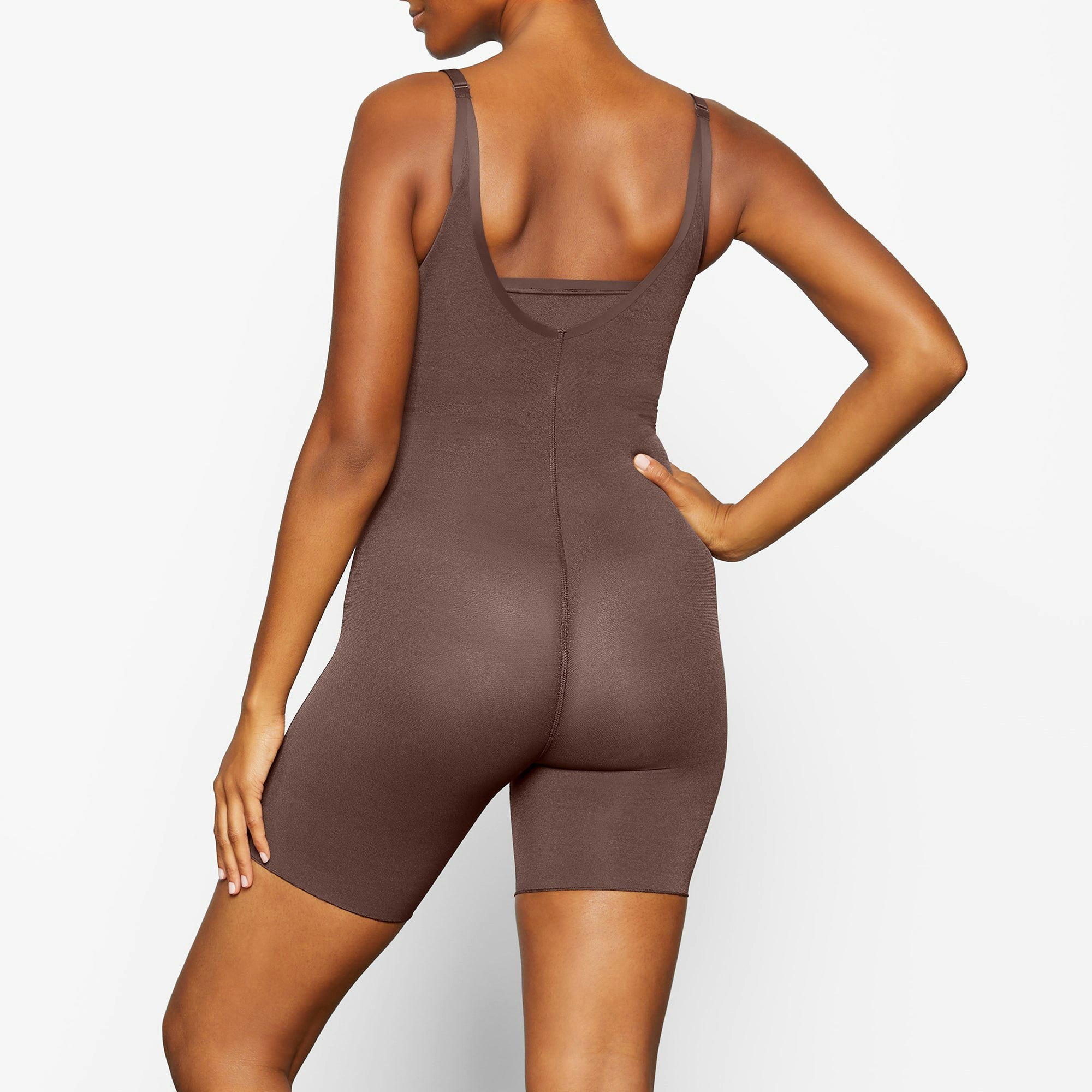 SHEER SCULPT OPEN BUST BODYSUIT ON A MODEL BACK VIEW