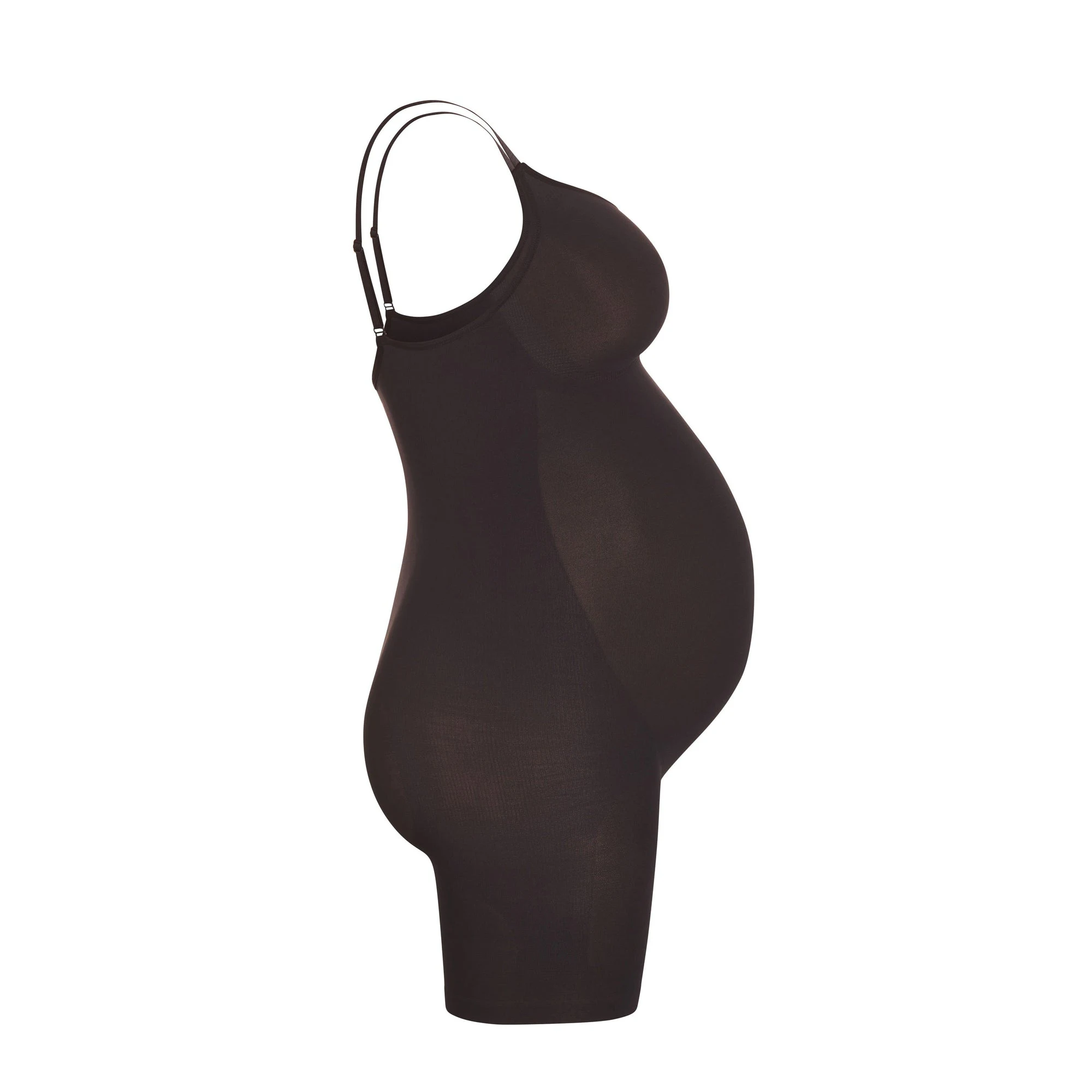 A MODEL STANDS FACING FORWARD WEARING THE MATERNITY SCULPTING BODYSUIT MID THIGH | ONYX