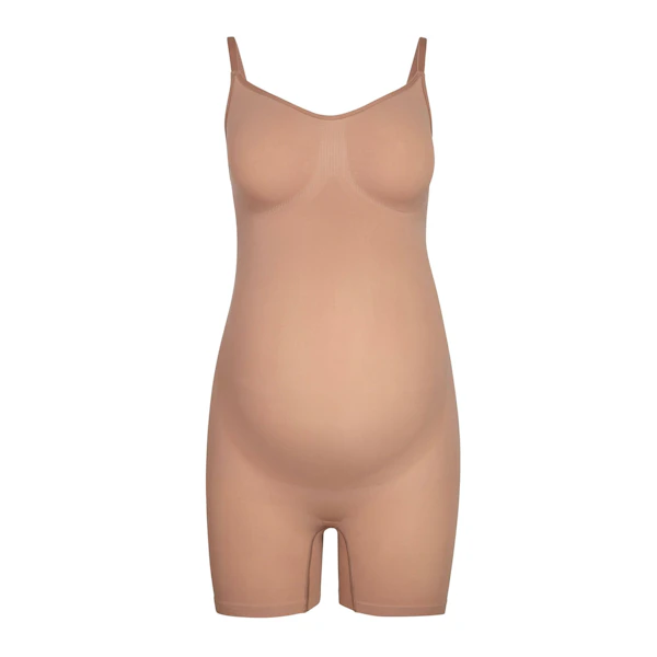 MATERNITY SCULPTING BODYSUIT MID THIGH | SIENNA (MATERNITY SHAPEWEAR, BODYSUITS) LAYS FLAT ON A WHITE BACKGROUND | FLT