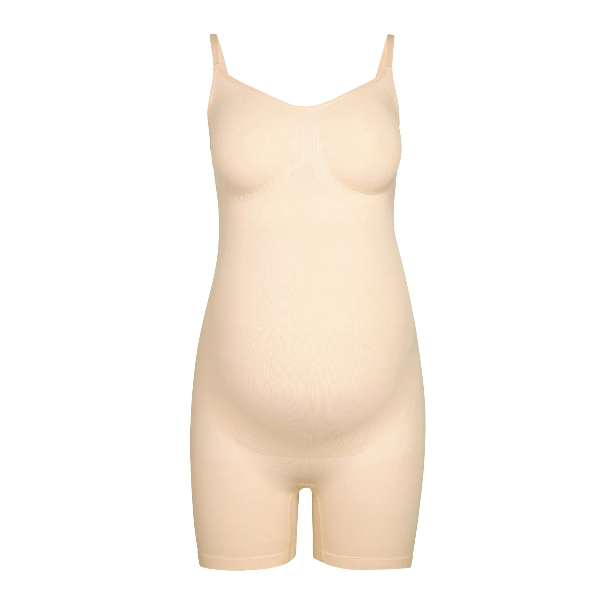 MATERNITY SCULPTING BODYSUIT MID THIGH | SAND (MATERNITY SHAPEWEAR, BODYSUITS) LAYS FLAT ON A WHITE BACKGROUND | FLT